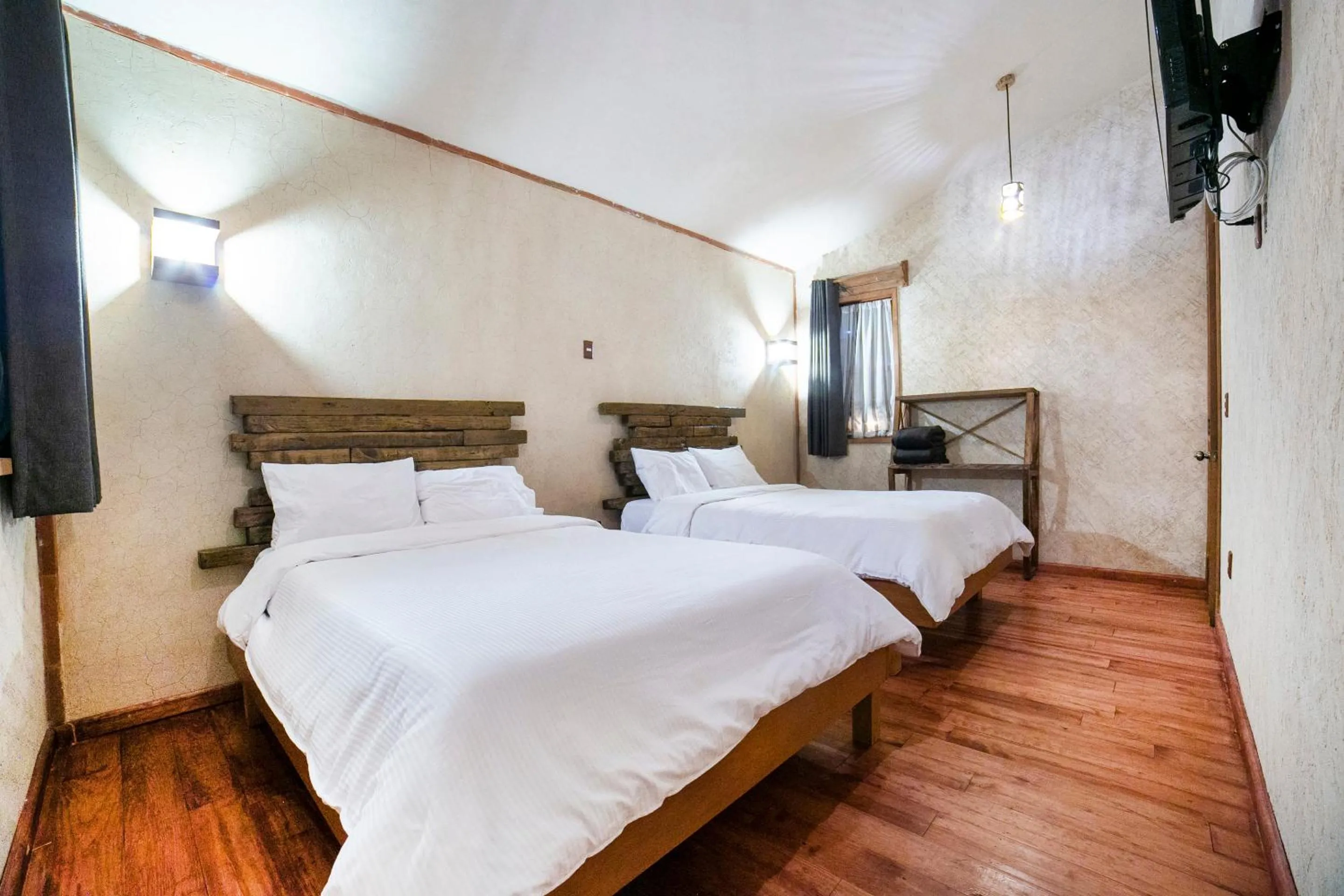 Bedroom in Capital O Collection O Casona De Minas Mineral del Monte