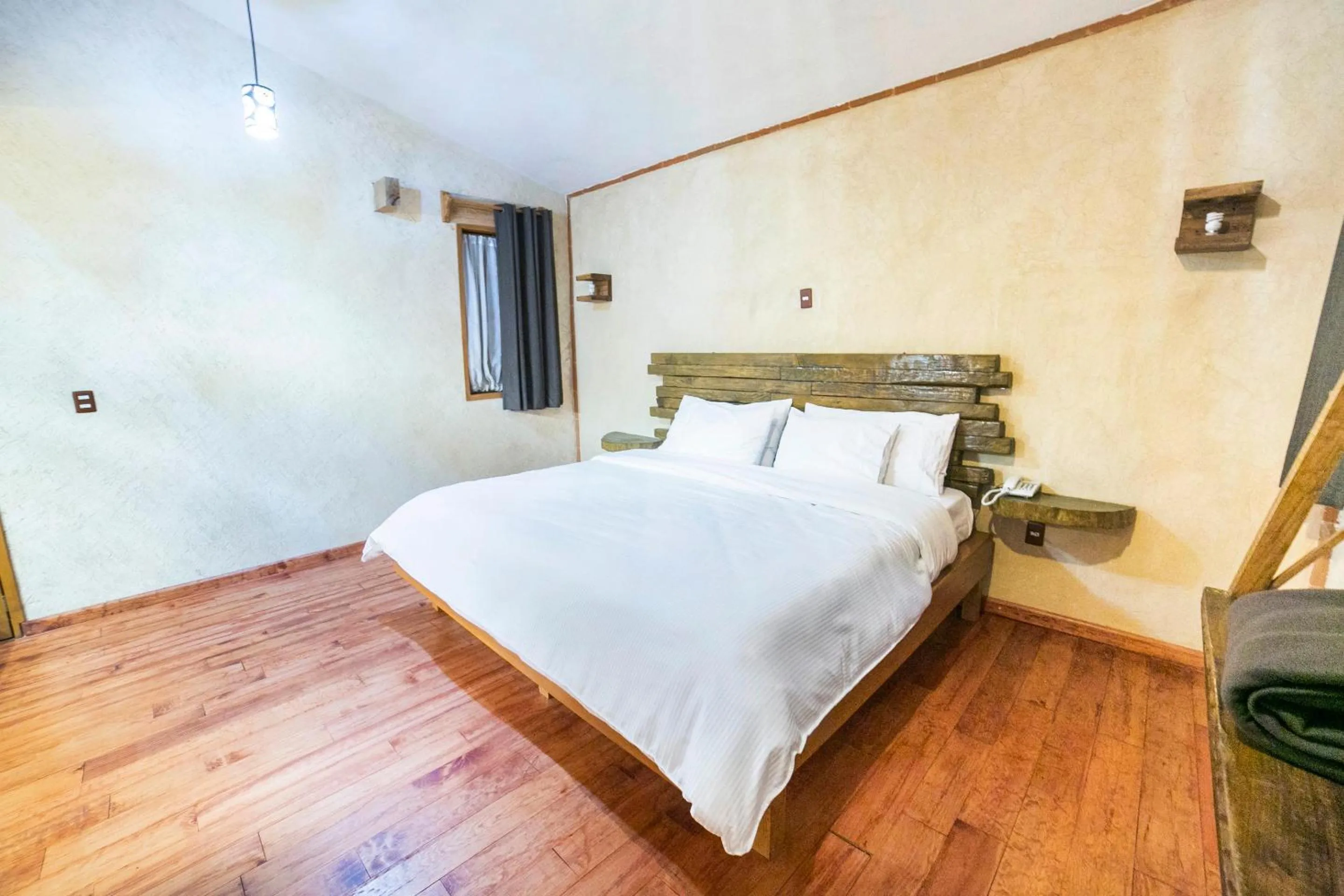 Bedroom in Capital O Collection O Casona De Minas Mineral del Monte