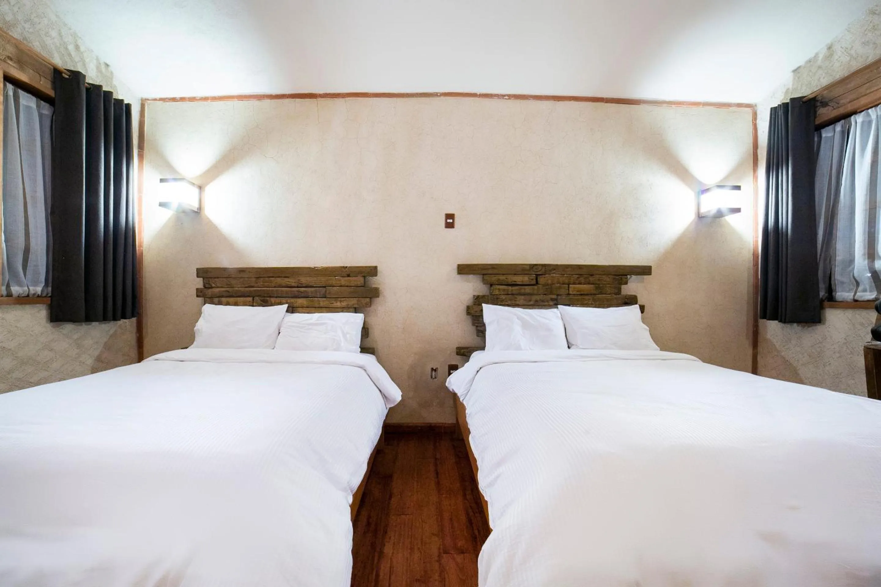 Bedroom in Capital O Collection O Casona De Minas Mineral del Monte