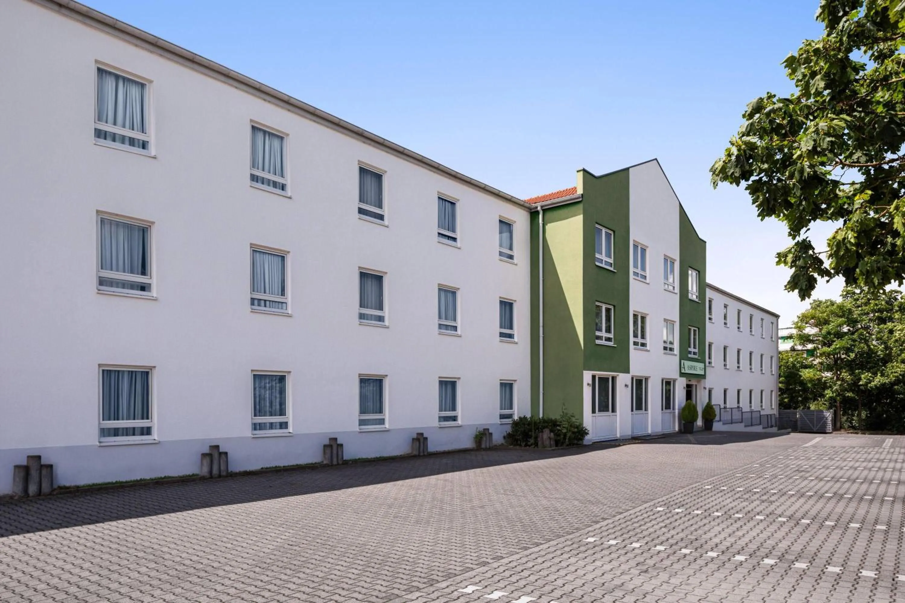 Property building in Aspire Frankfurt Airport, Trademark Collection by Wyndham