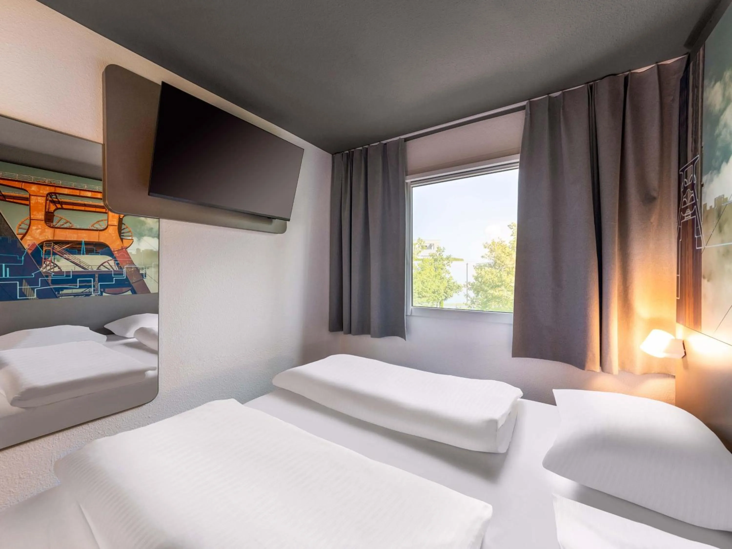 Photo of the whole room, Bed in B&B HOTEL Würzburg-Ost