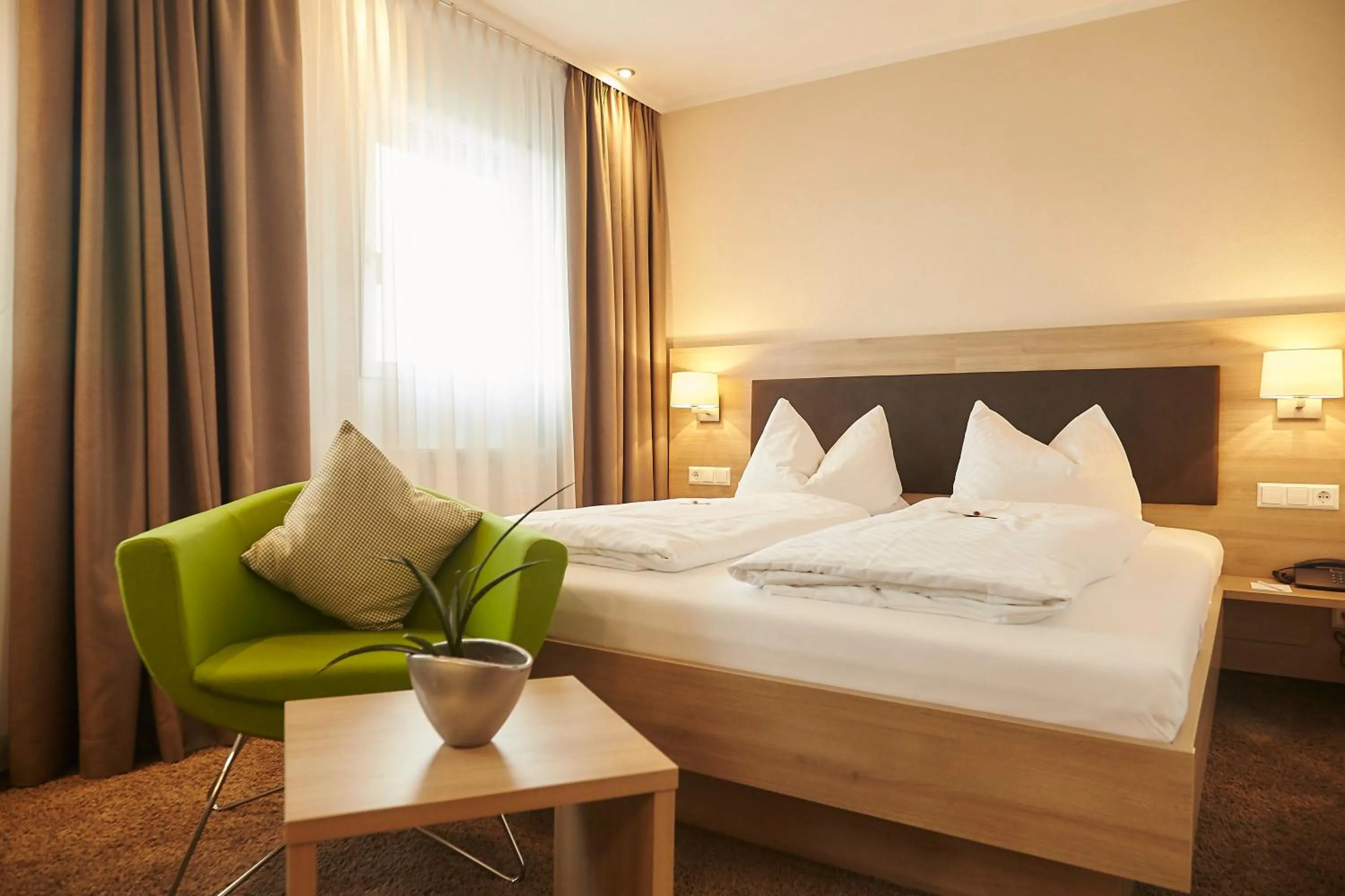 Photo of the whole room, Bed in Flair Hotel Grüner Baum