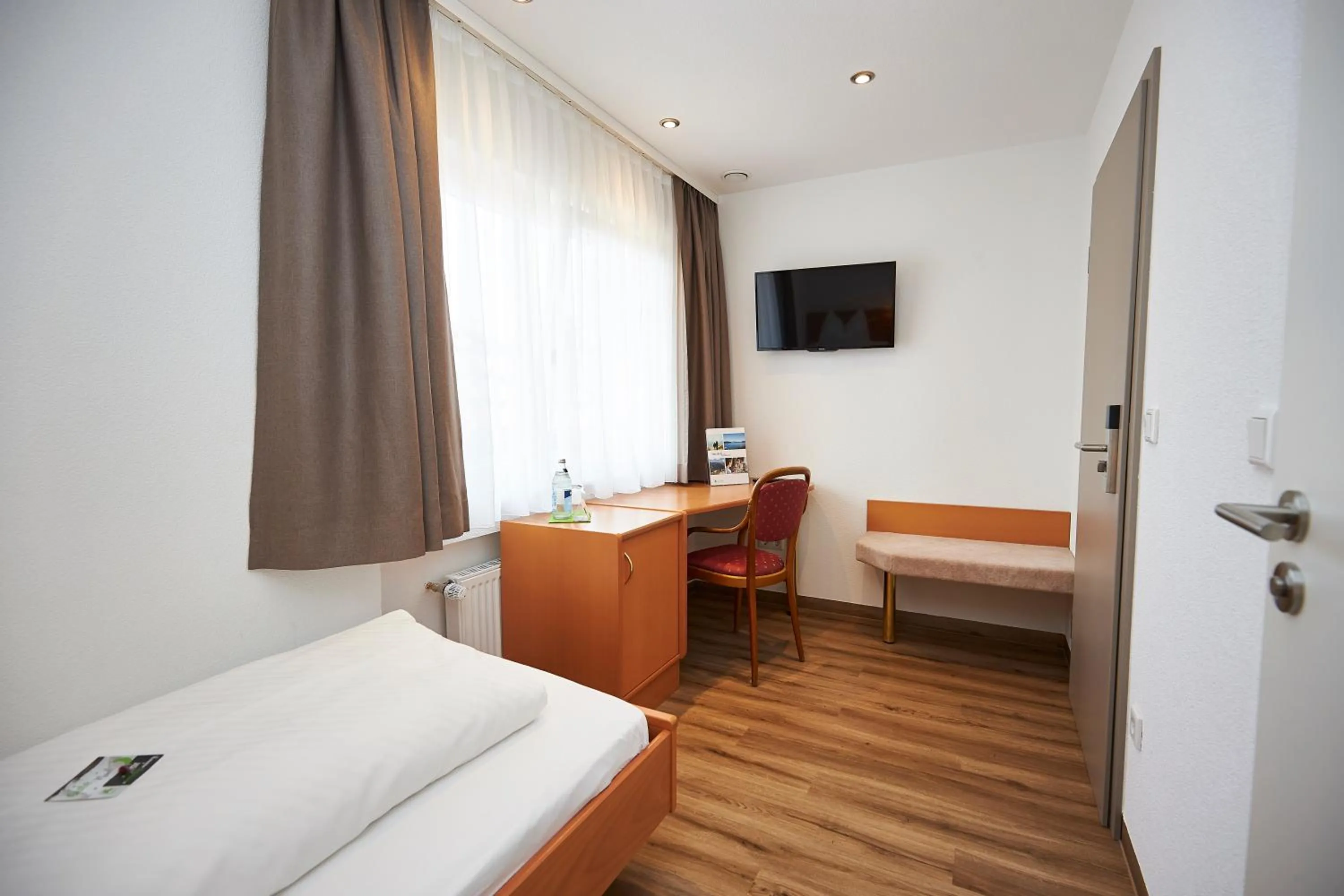 Bed in Flair Hotel Grüner Baum