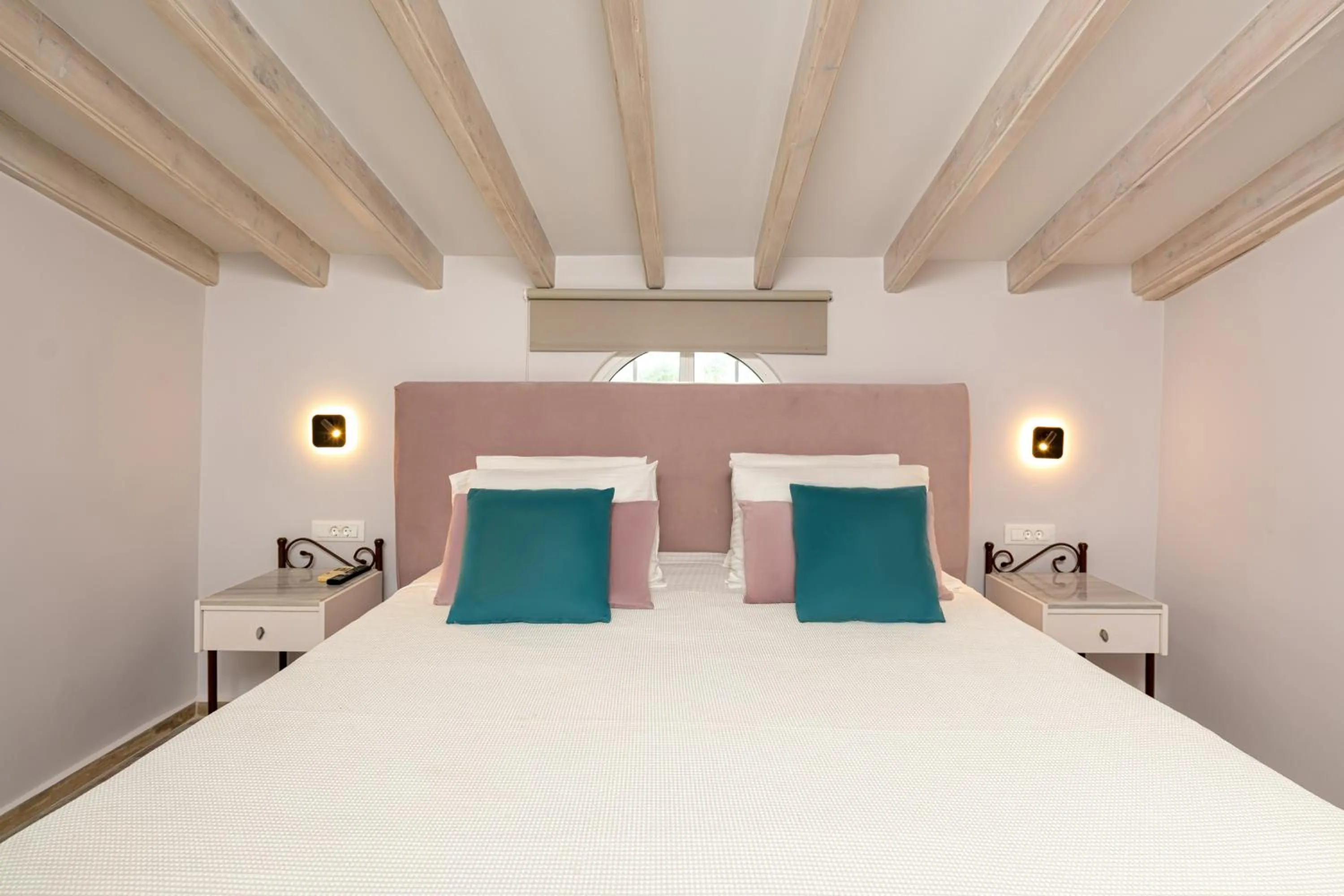 Bed in KORINA APART HOTEL KAVOS