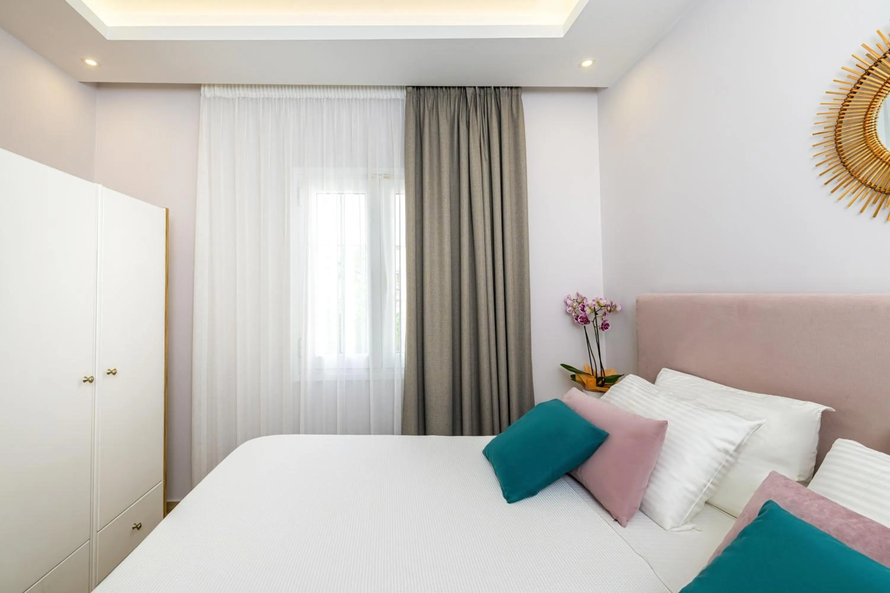 Bed in KORINA APART HOTEL KAVOS