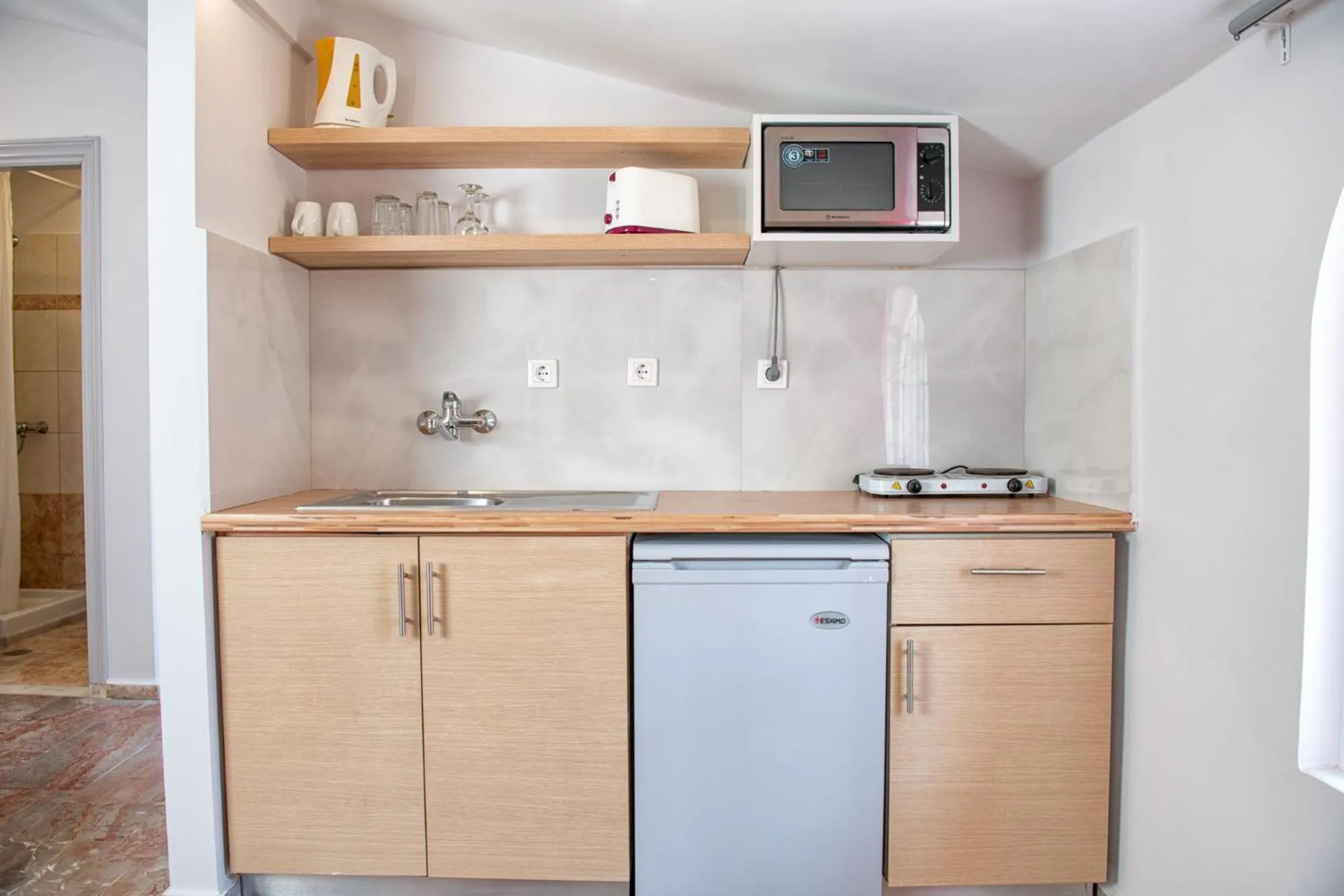 kitchen in KORINA APART HOTEL KAVOS