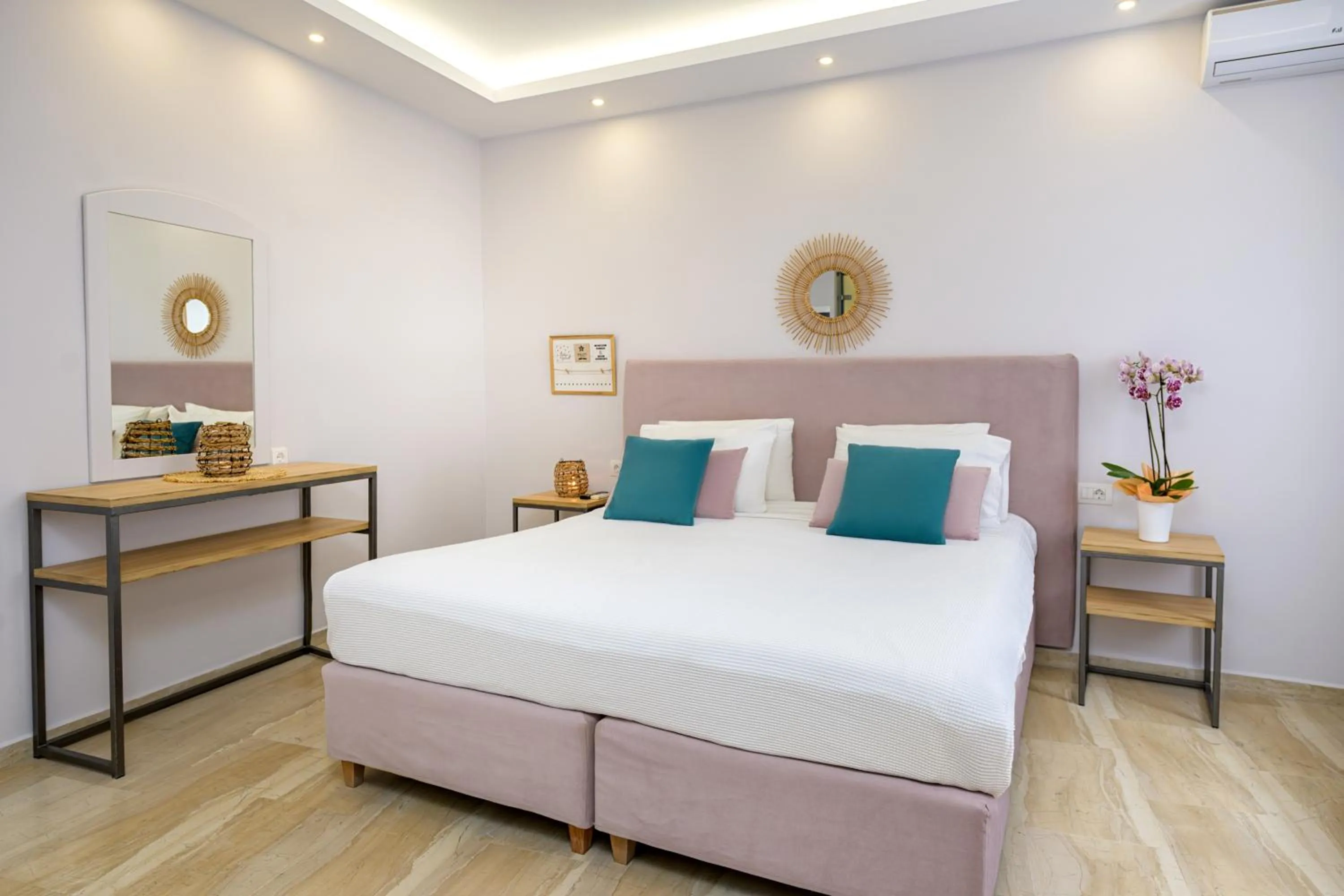 Bed in KORINA APART HOTEL KAVOS