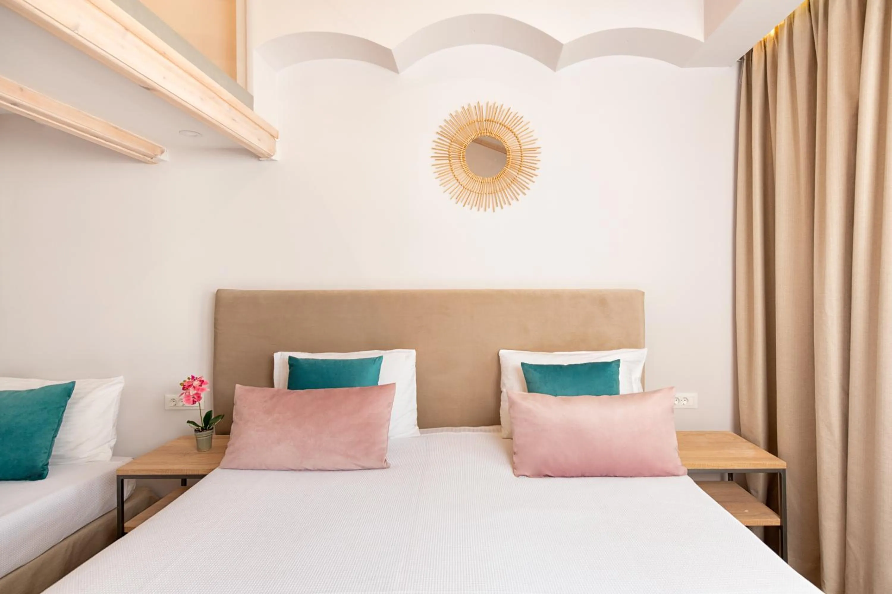 Bed in KORINA APART HOTEL KAVOS