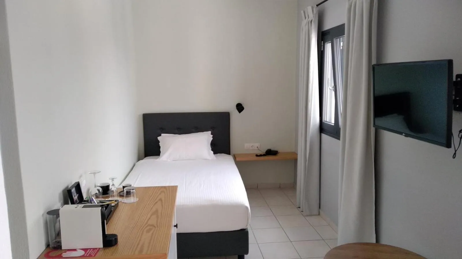 Bed in Minois Boutique Hotel