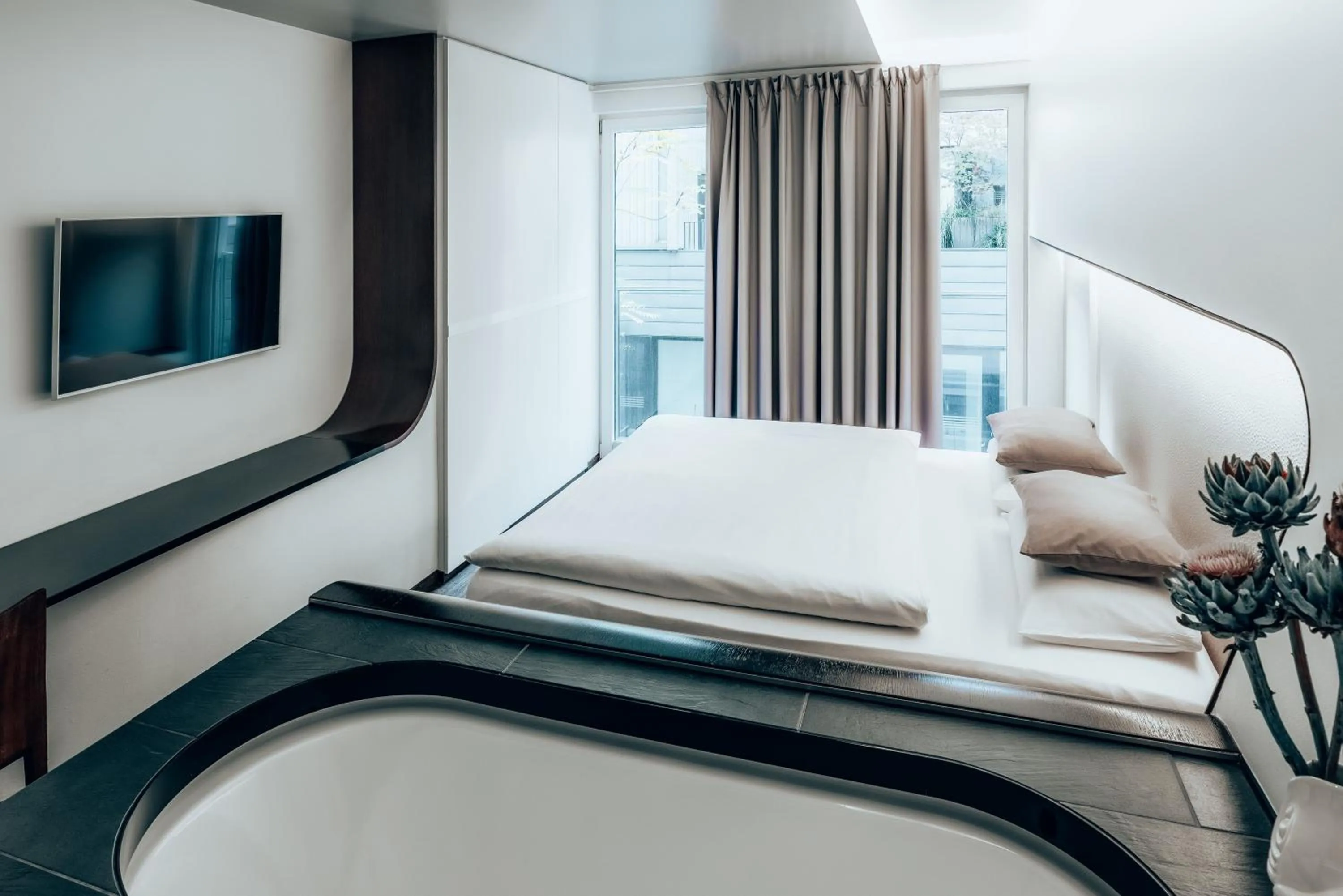 Photo of the whole room, Bed in Hotel Q! Berlin