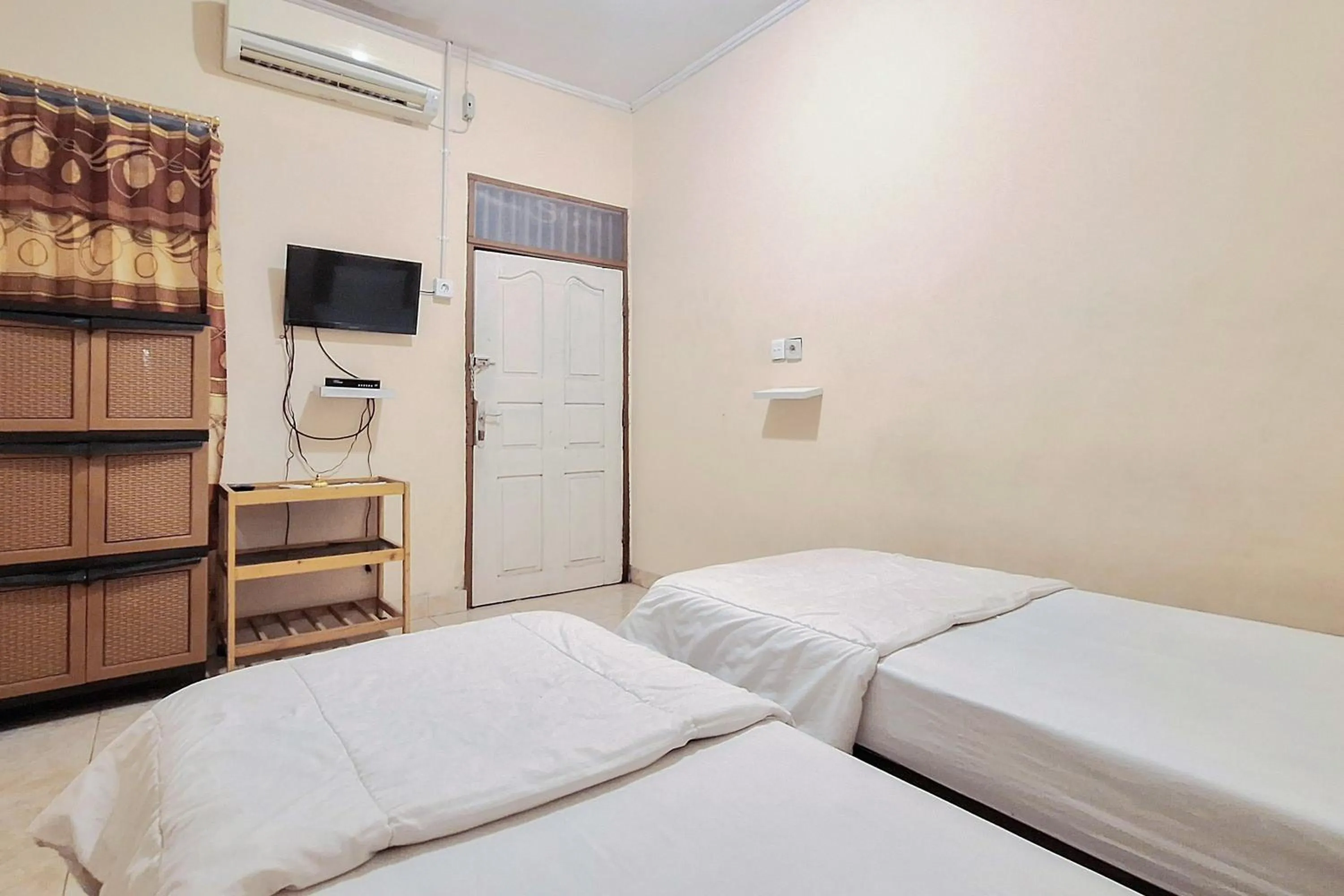 Bed in Handira Homestay Syariah Padang RedPartner