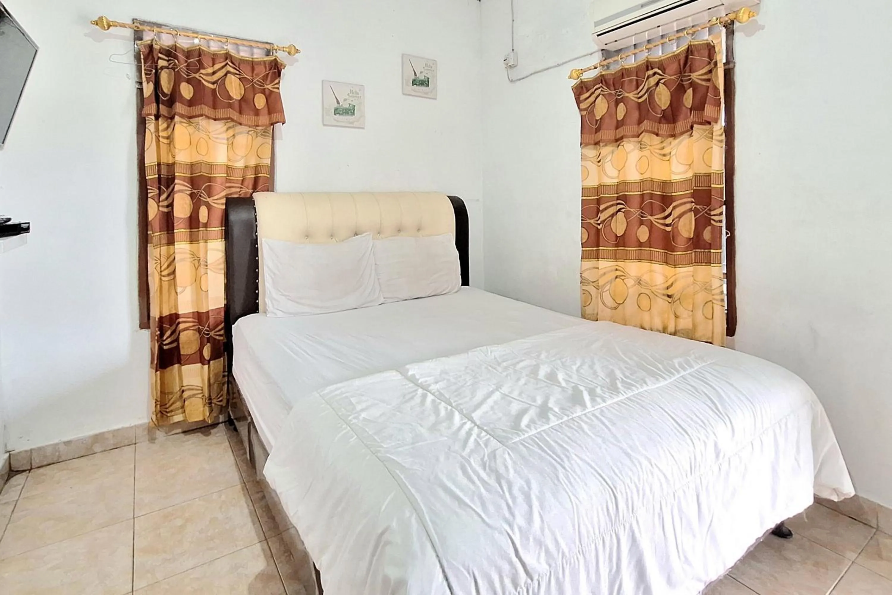 Bed in Handira Homestay Syariah Padang RedPartner