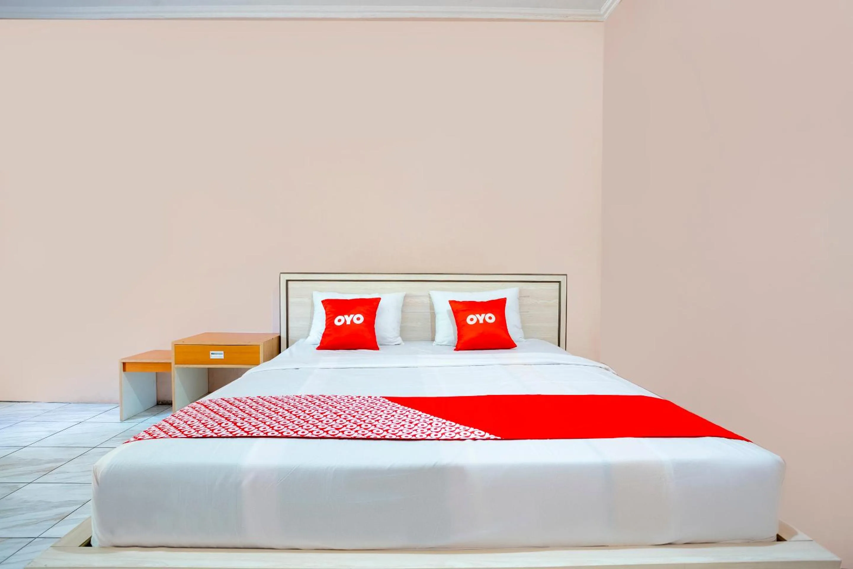 Bedroom in SPOT ON 2974 Penginapan Roma 88