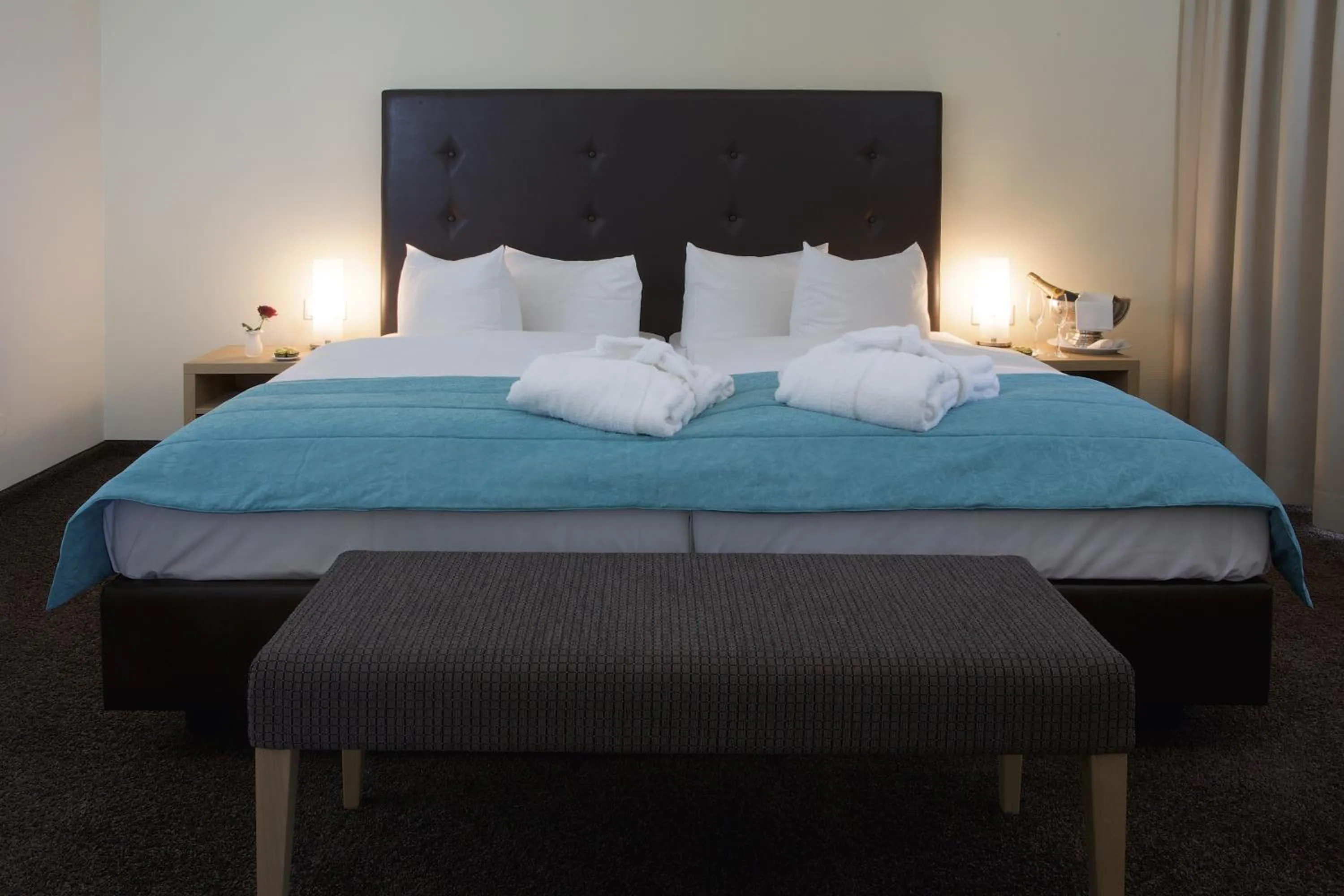 Bed in Concorde Hotel Viktoria