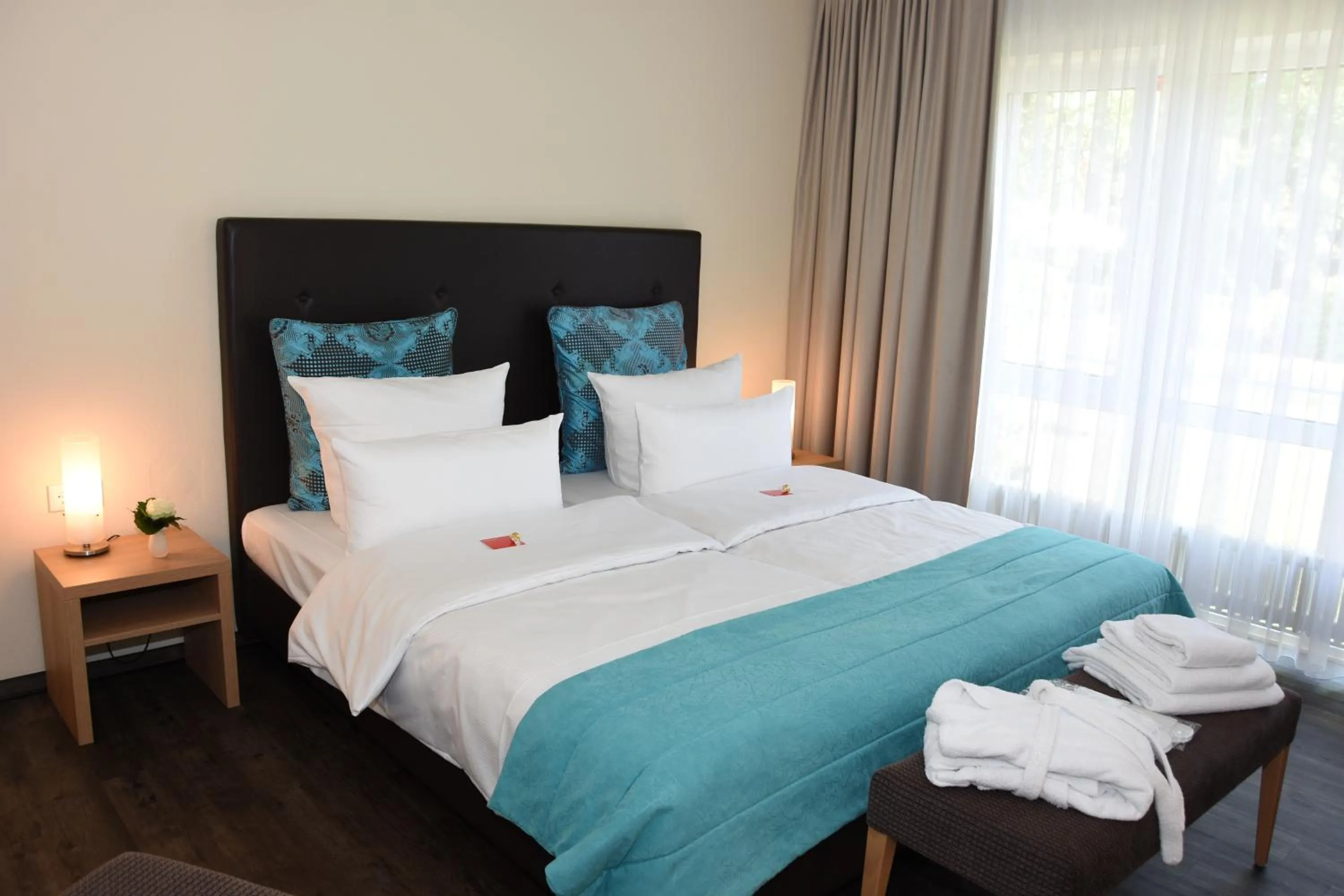 Bed in Concorde Hotel Viktoria