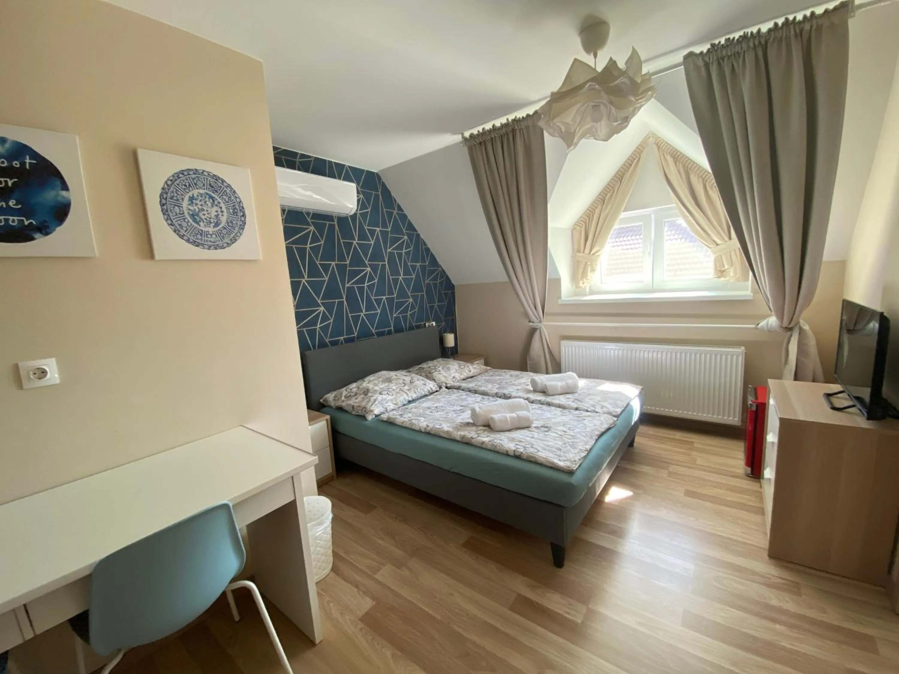 Bed in Oázis Panzió