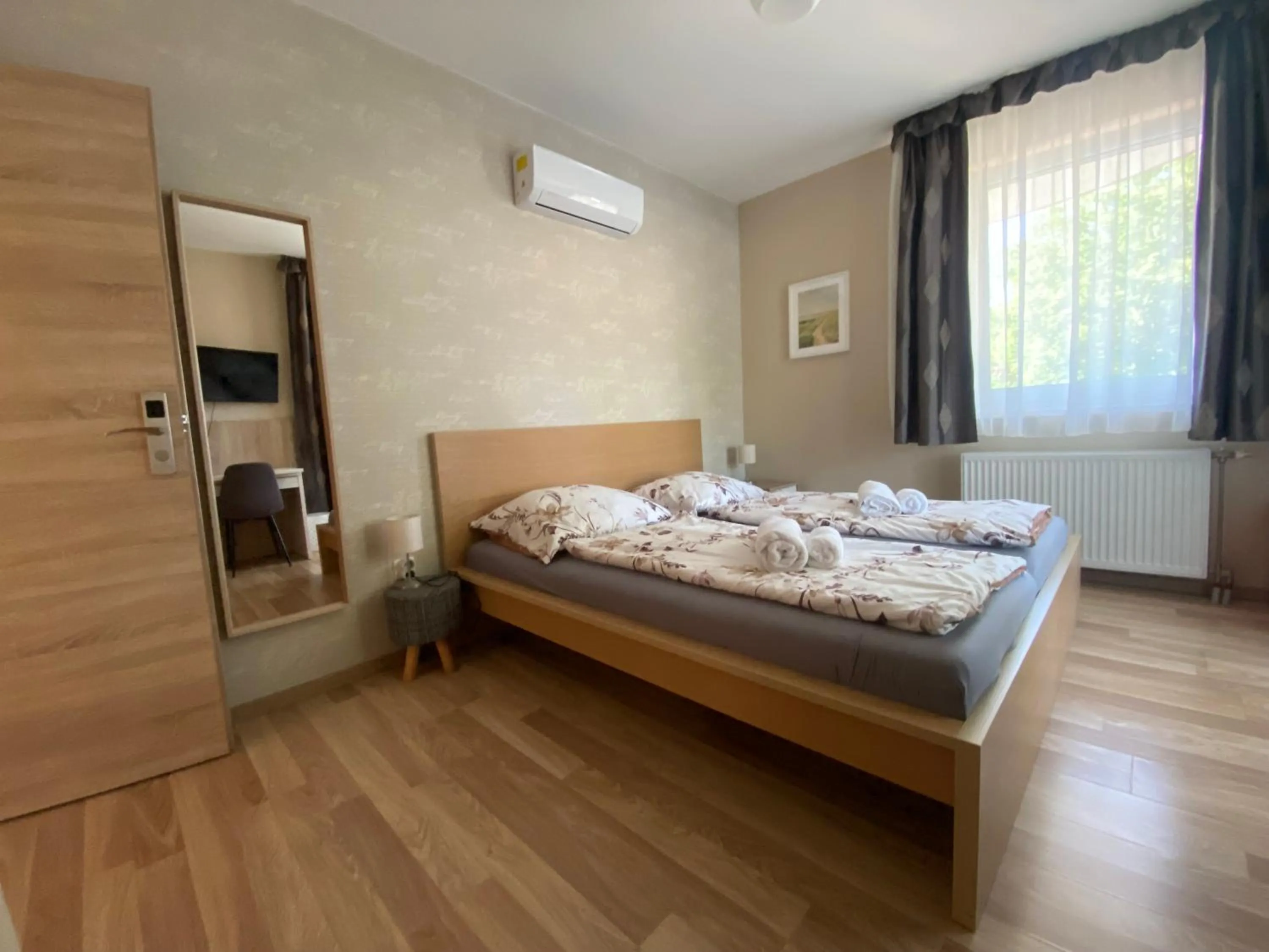 Bed in Oázis Panzió