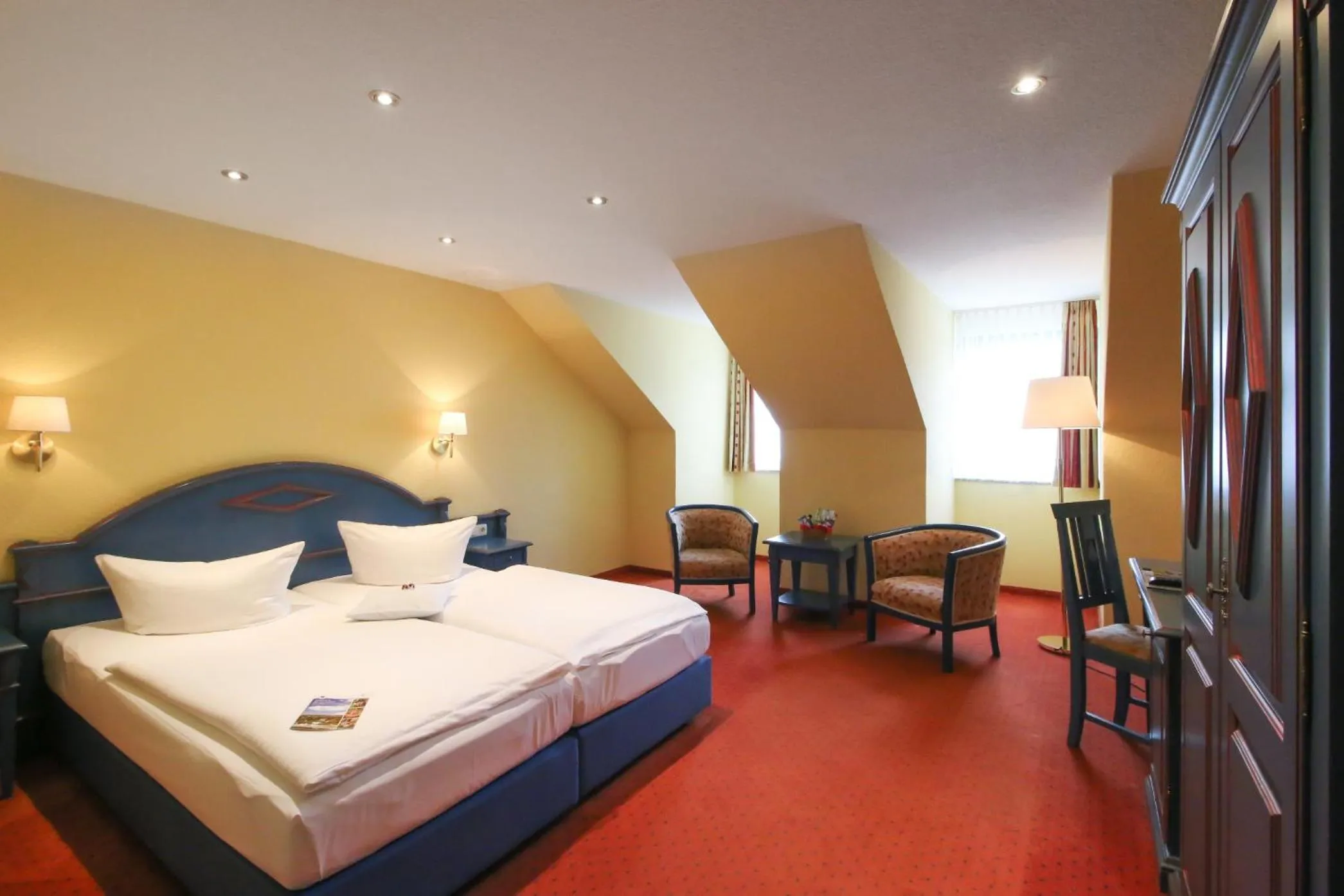 Photo of the whole room, Bed in Hotel Erbgericht Buntes Haus