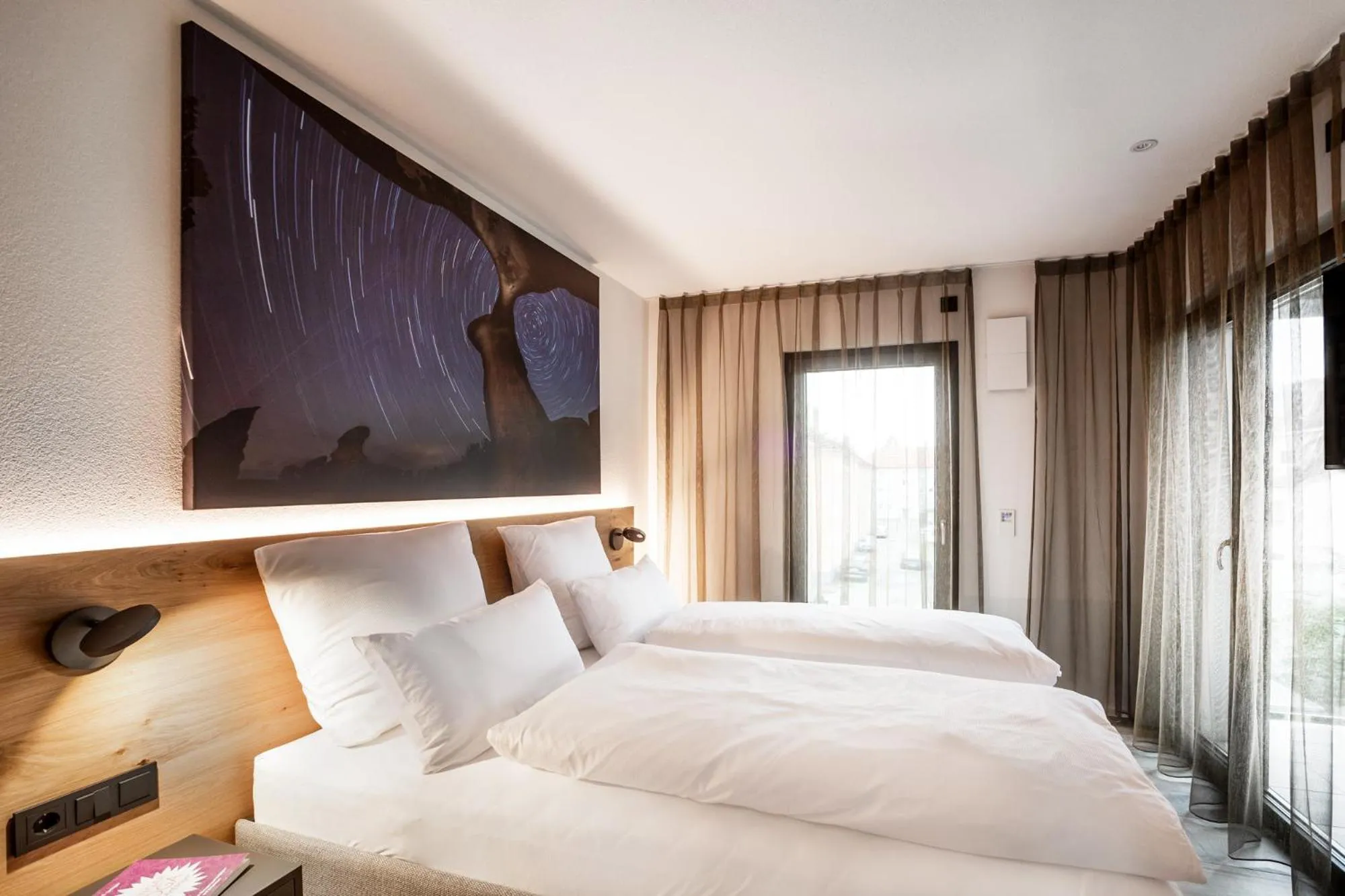 Bed in PRIMERA Apartments