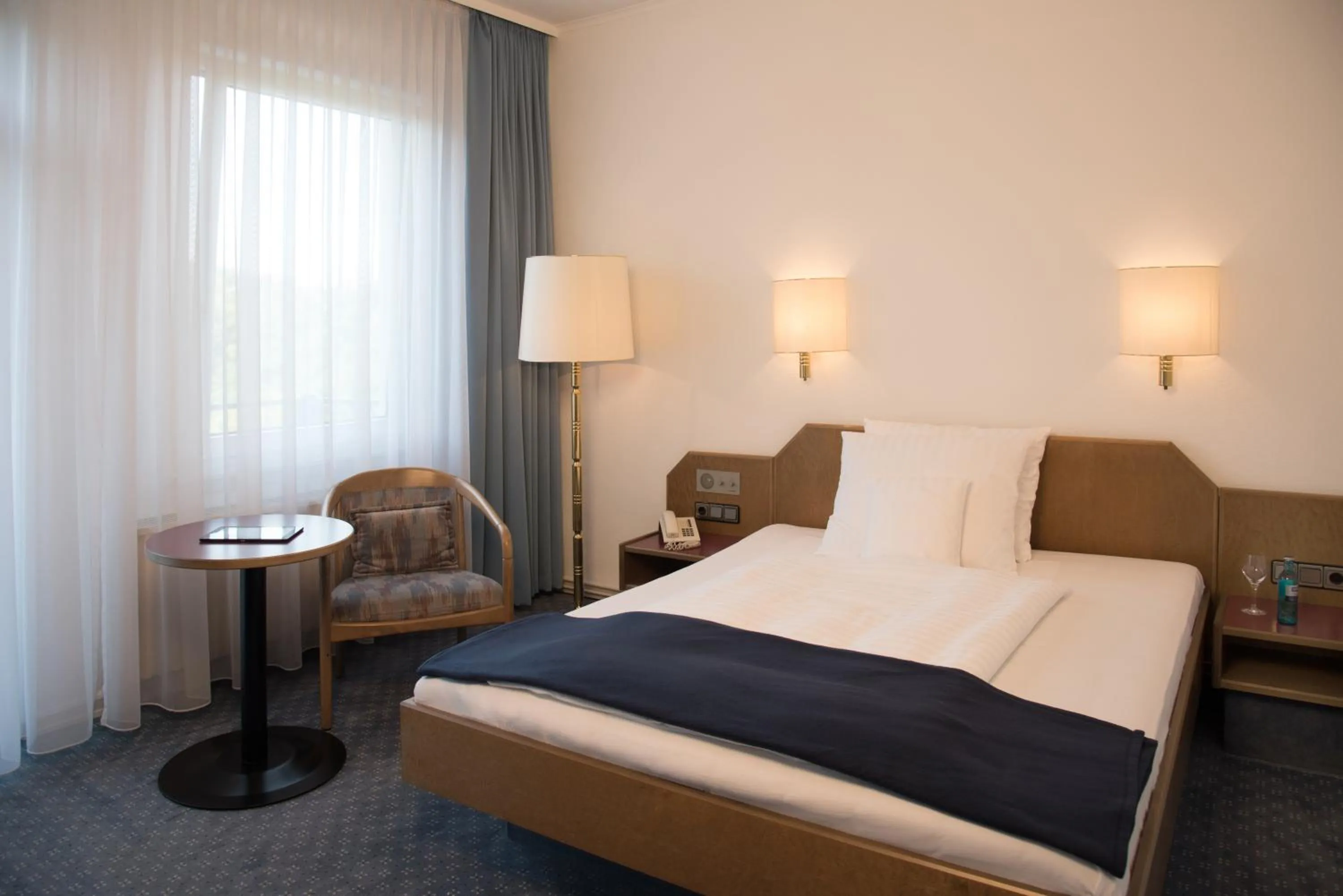 Photo of the whole room, Bed in Parkhotel Bad Homburg