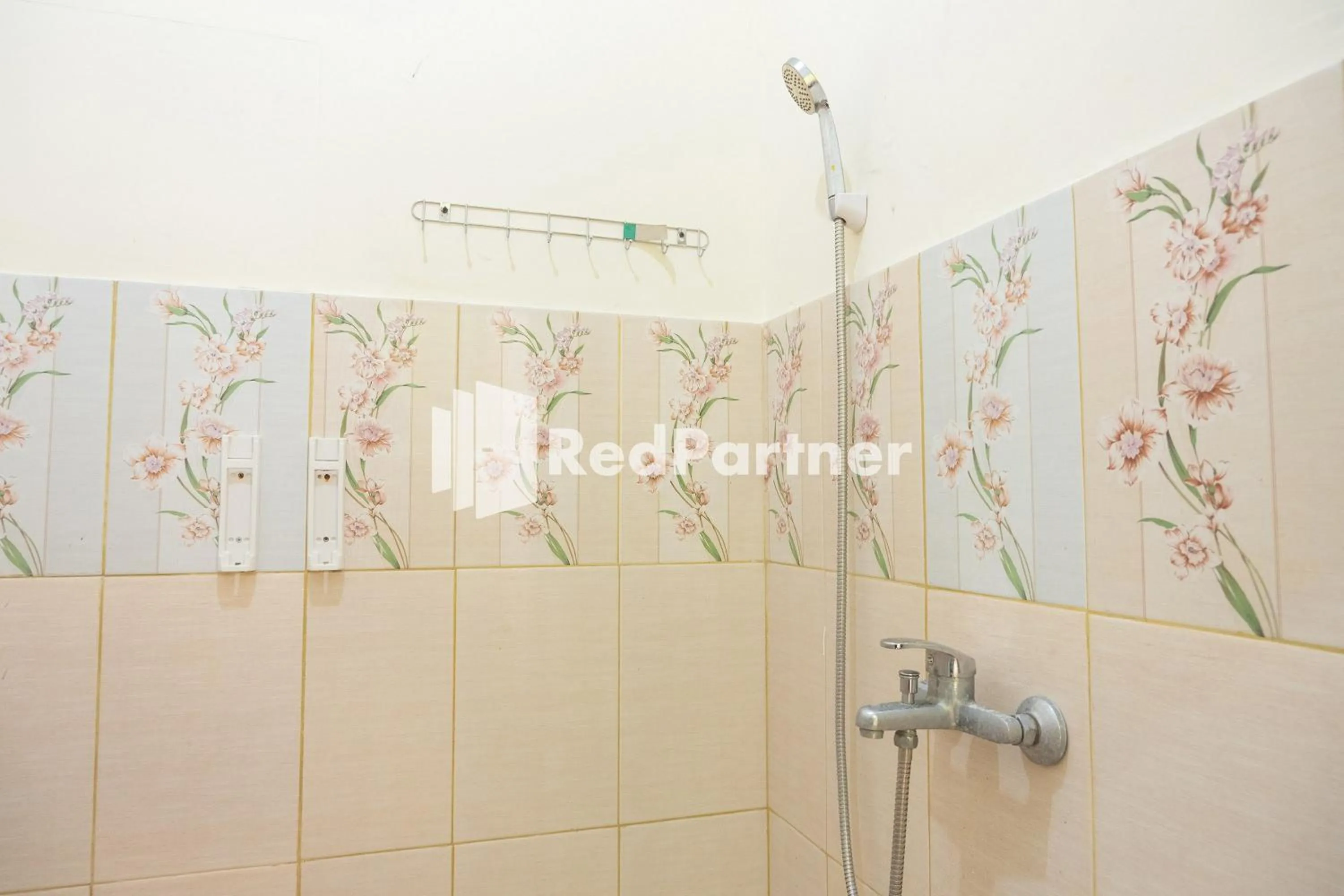 Bathroom in Wisma Handayani Syariah RedPartner near RSUD Wonosari