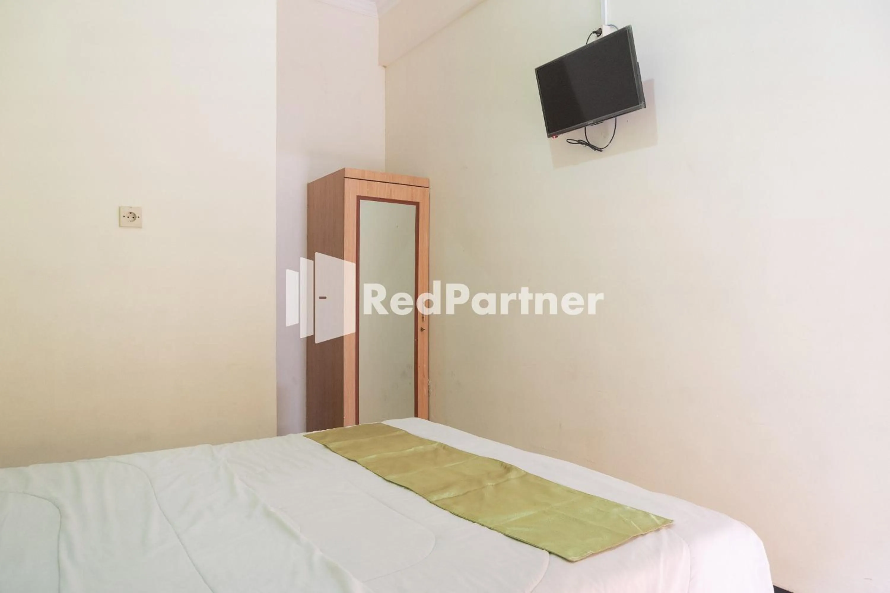 Bedroom, Bed in Wisma Handayani Syariah RedPartner near RSUD Wonosari