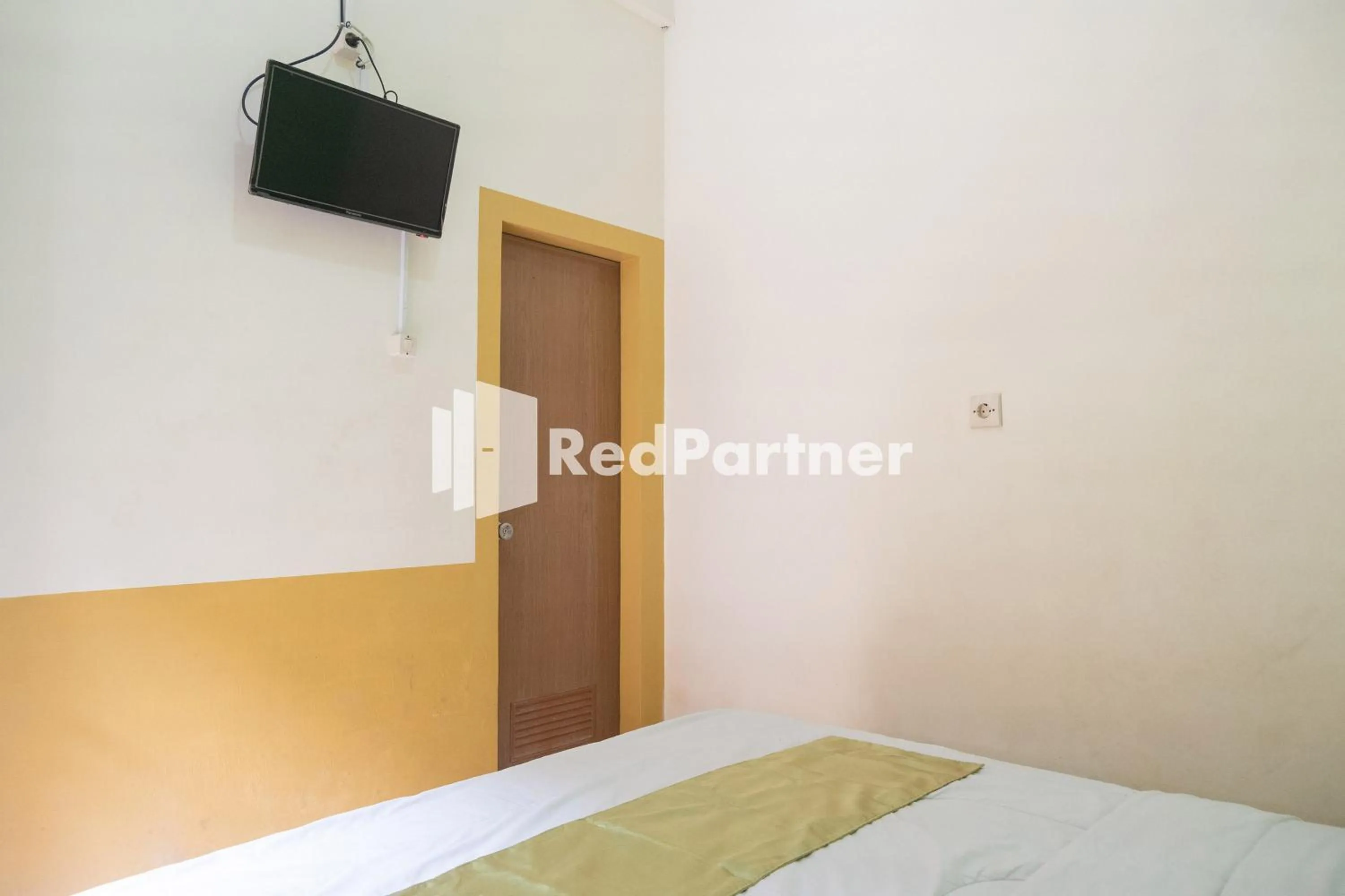 Bedroom, Bed in Wisma Handayani Syariah RedPartner near RSUD Wonosari
