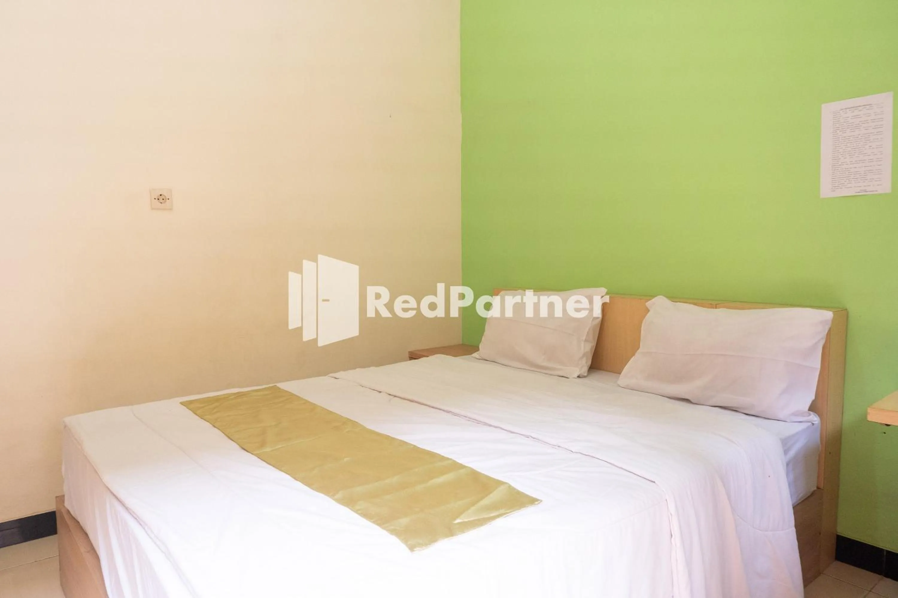 Bedroom, Bed in Wisma Handayani Syariah RedPartner near RSUD Wonosari