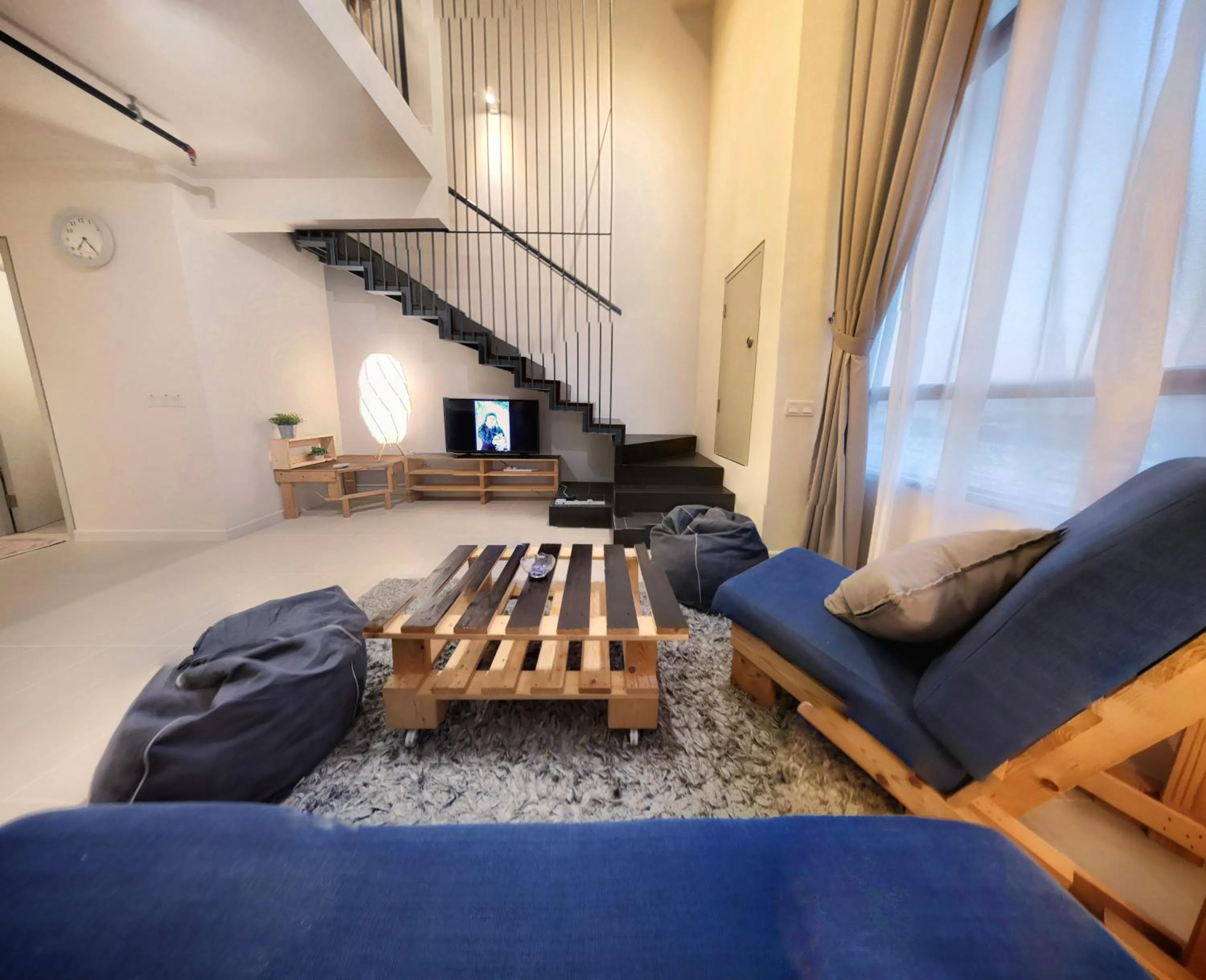 Living room in Tamarind Suites by BeeStay Management