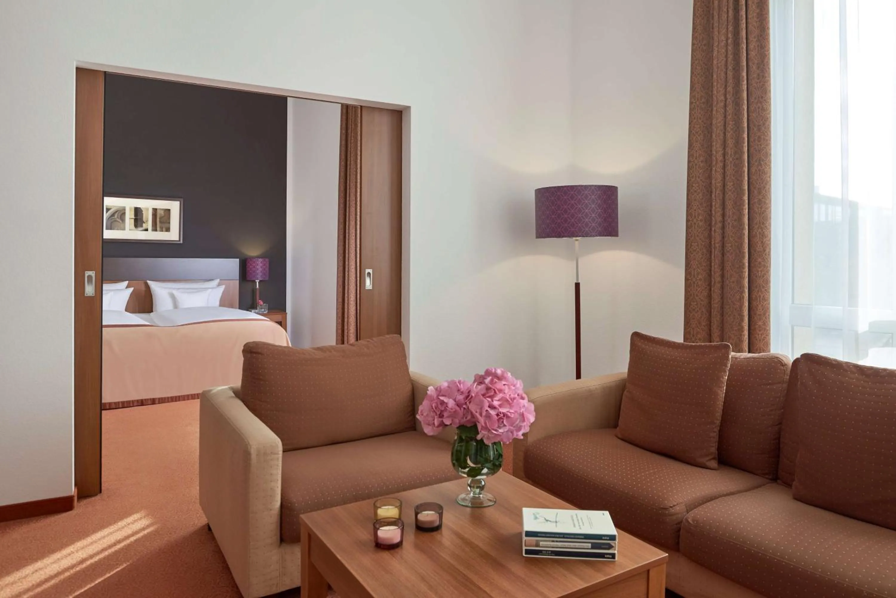 Living room, Bed in Dorint Hotel am Dom Erfurt