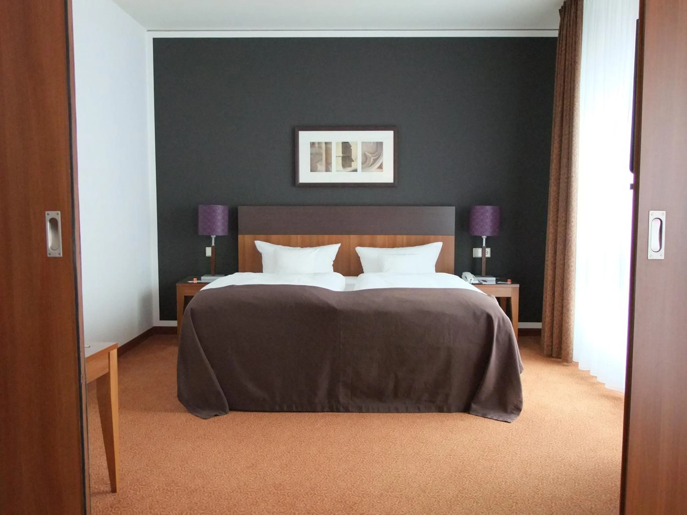 Photo of the whole room, Bed in Dorint Hotel am Dom Erfurt