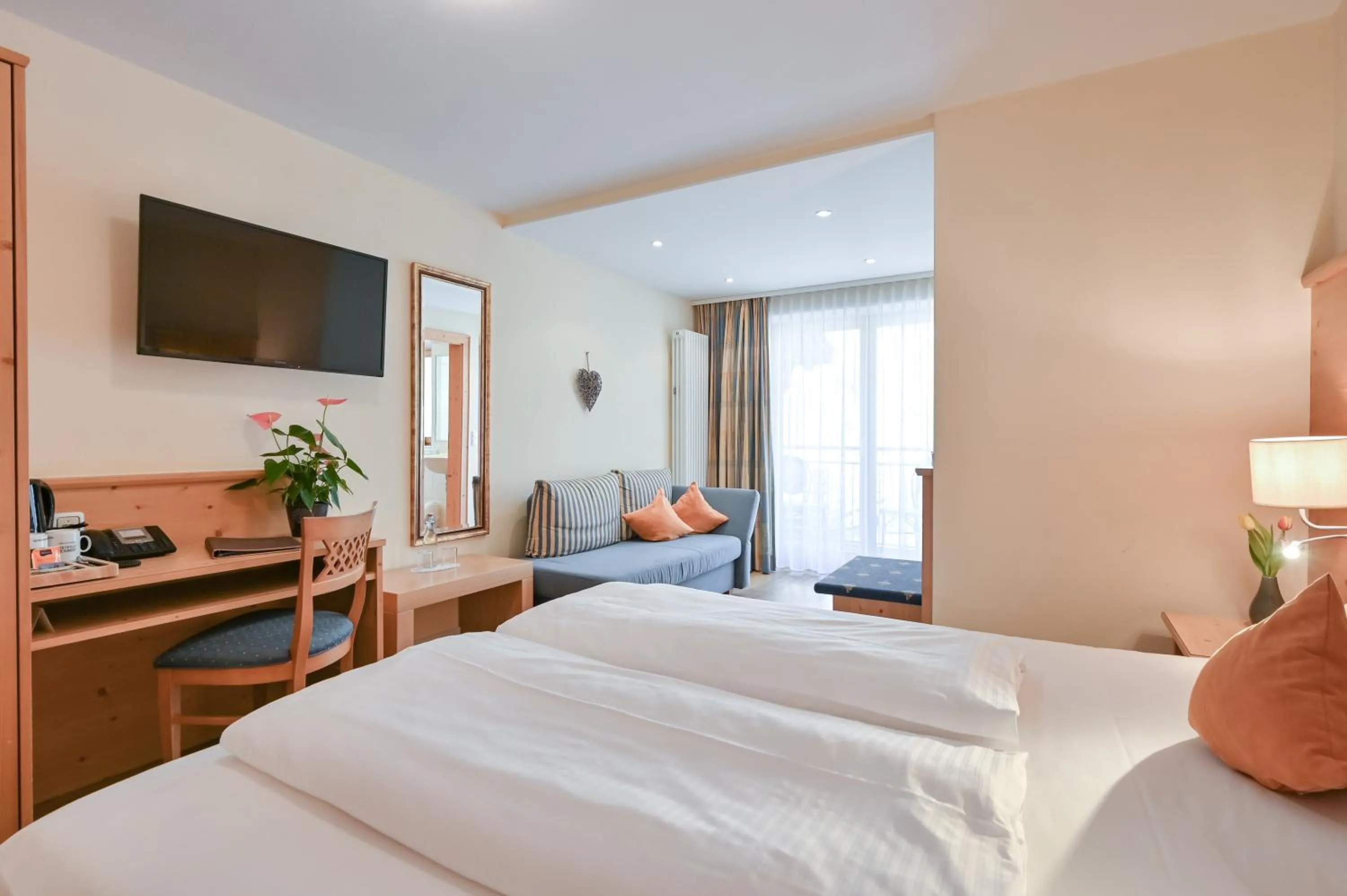 Bed in Hotel Alpenstuben