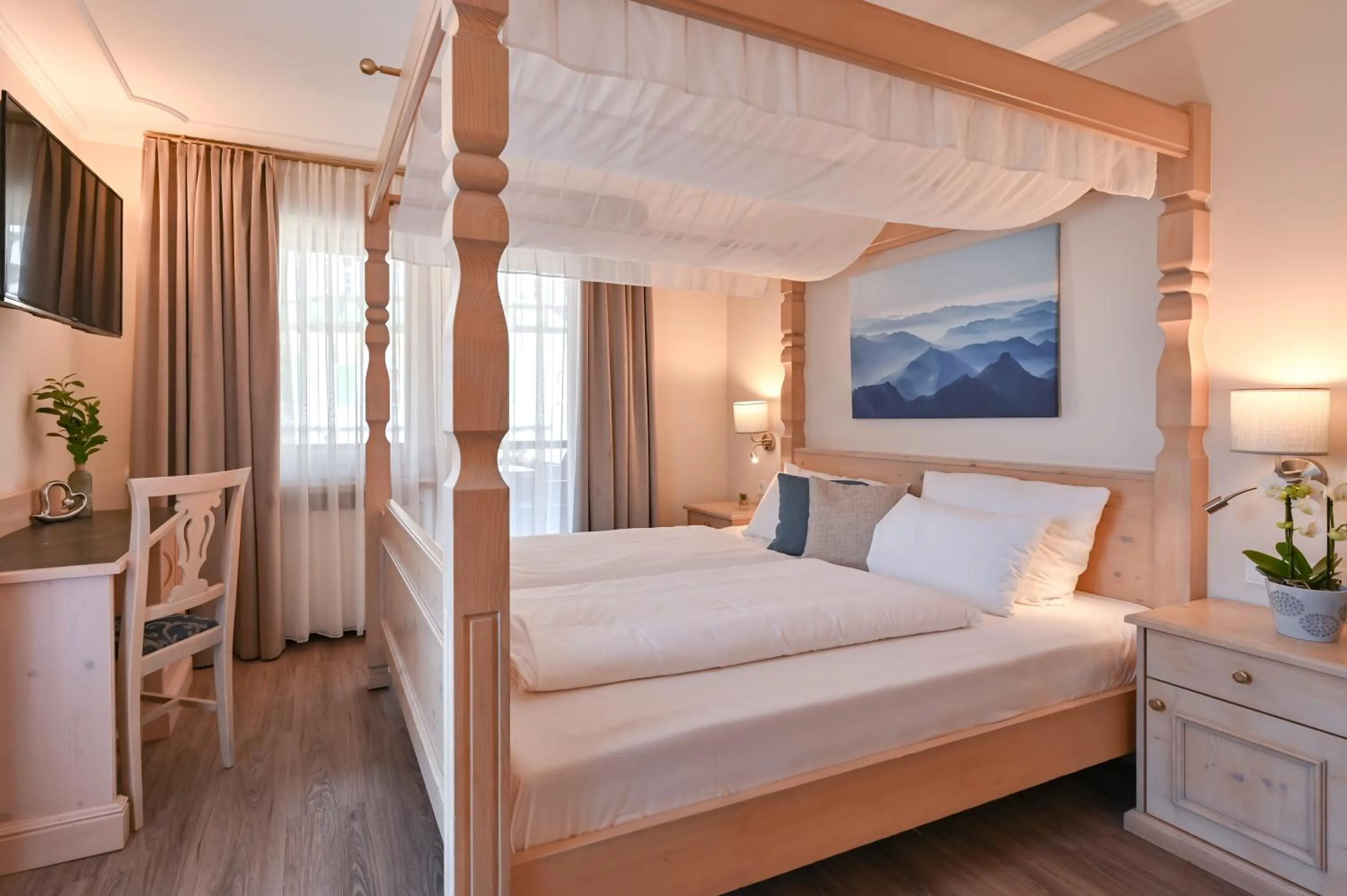 Bed in Hotel Alpenstuben