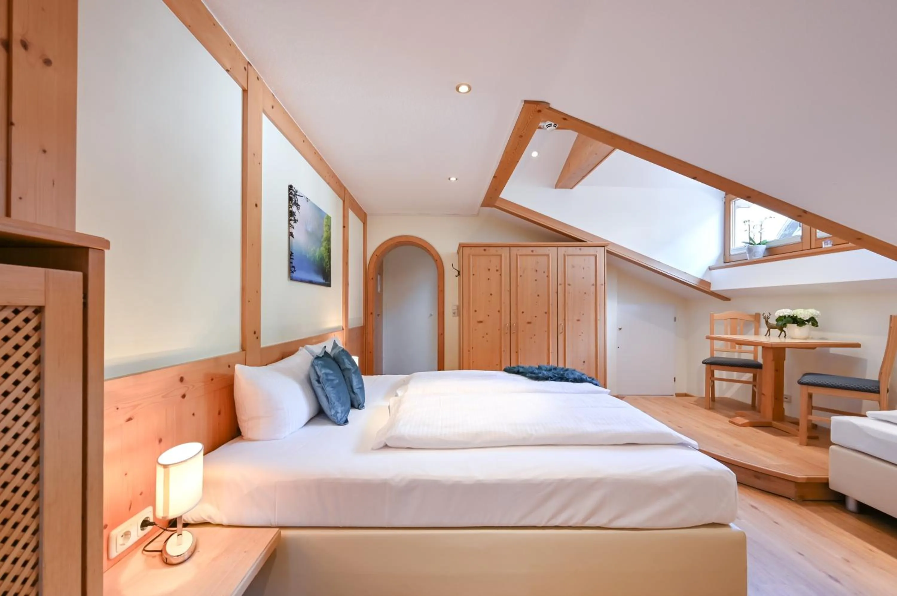 Bed in Hotel Alpenstuben