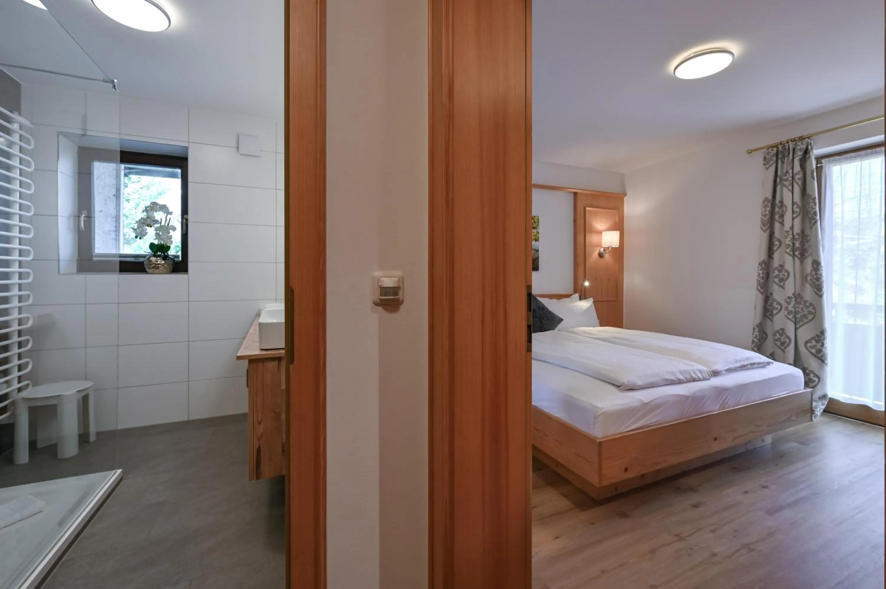 Bed in Hotel Alpenstuben