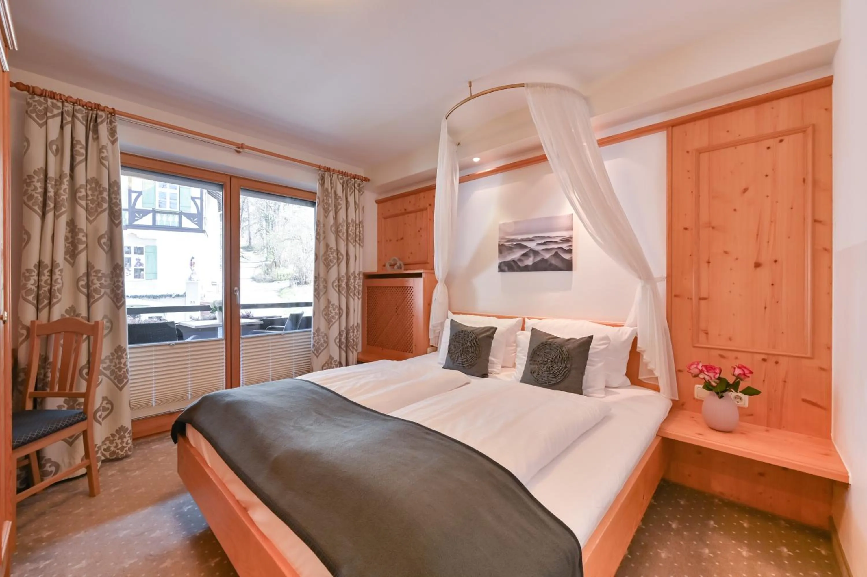 Bed in Hotel Alpenstuben