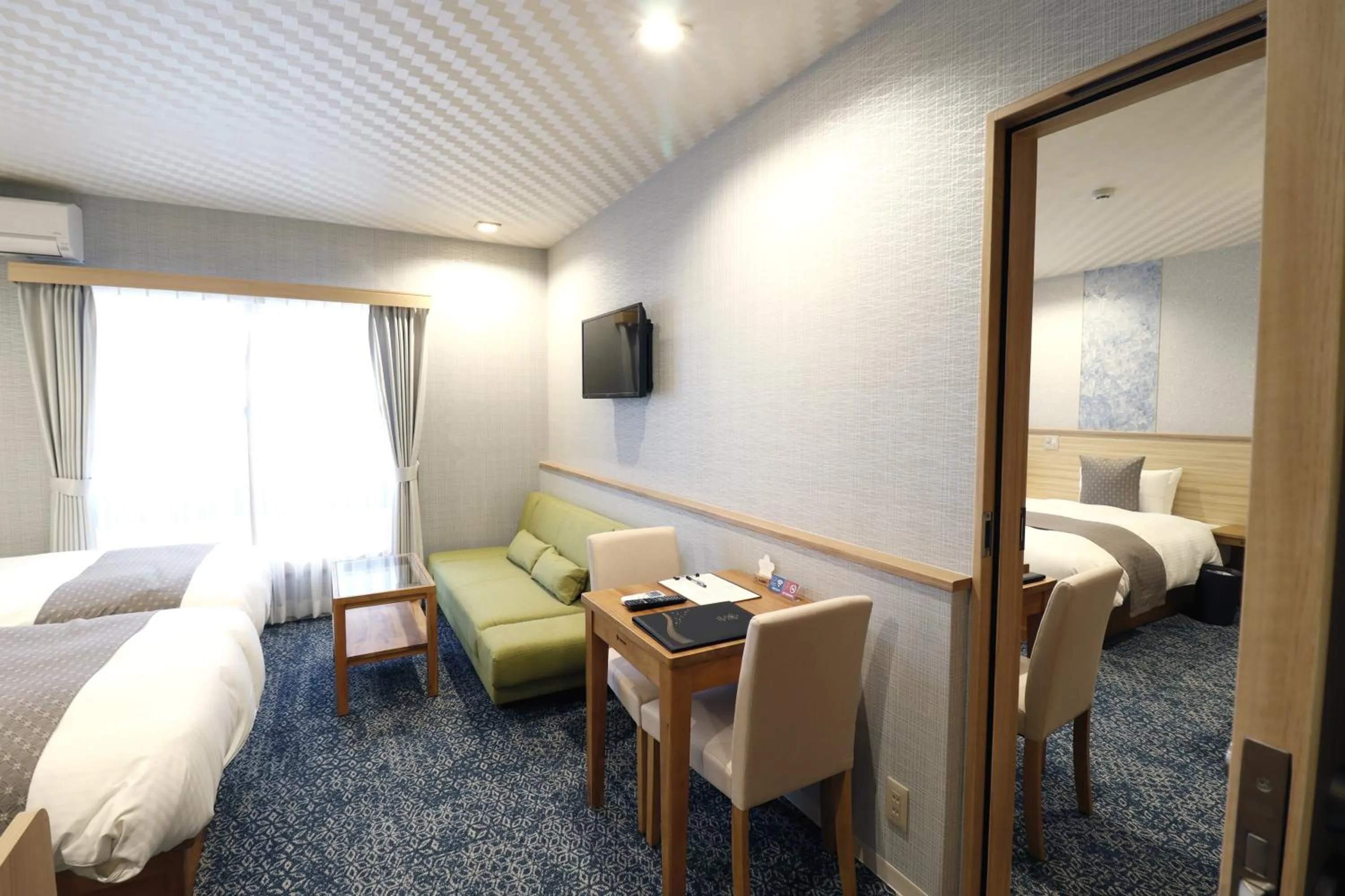 Living room, Bed in Stay SAKURA Kyoto Tambaguchi