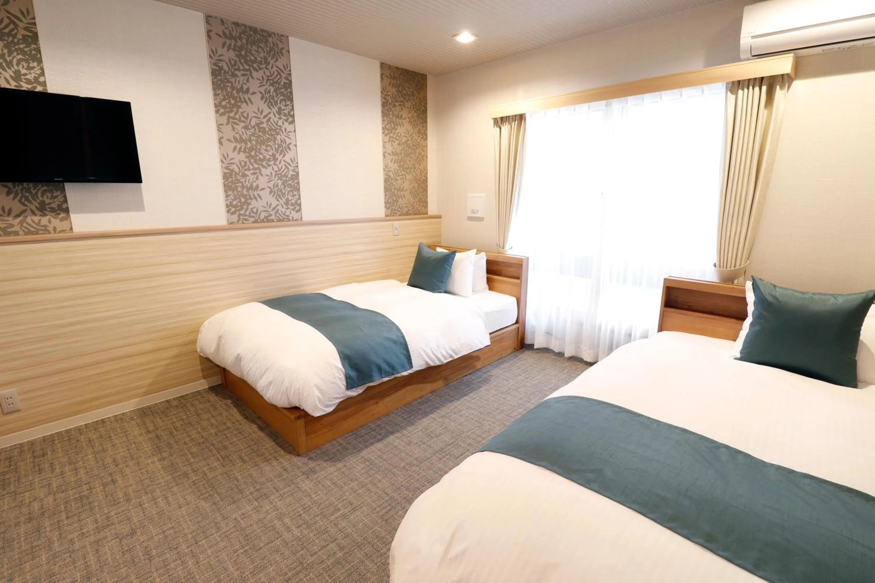 Bed in Stay SAKURA Kyoto Tambaguchi