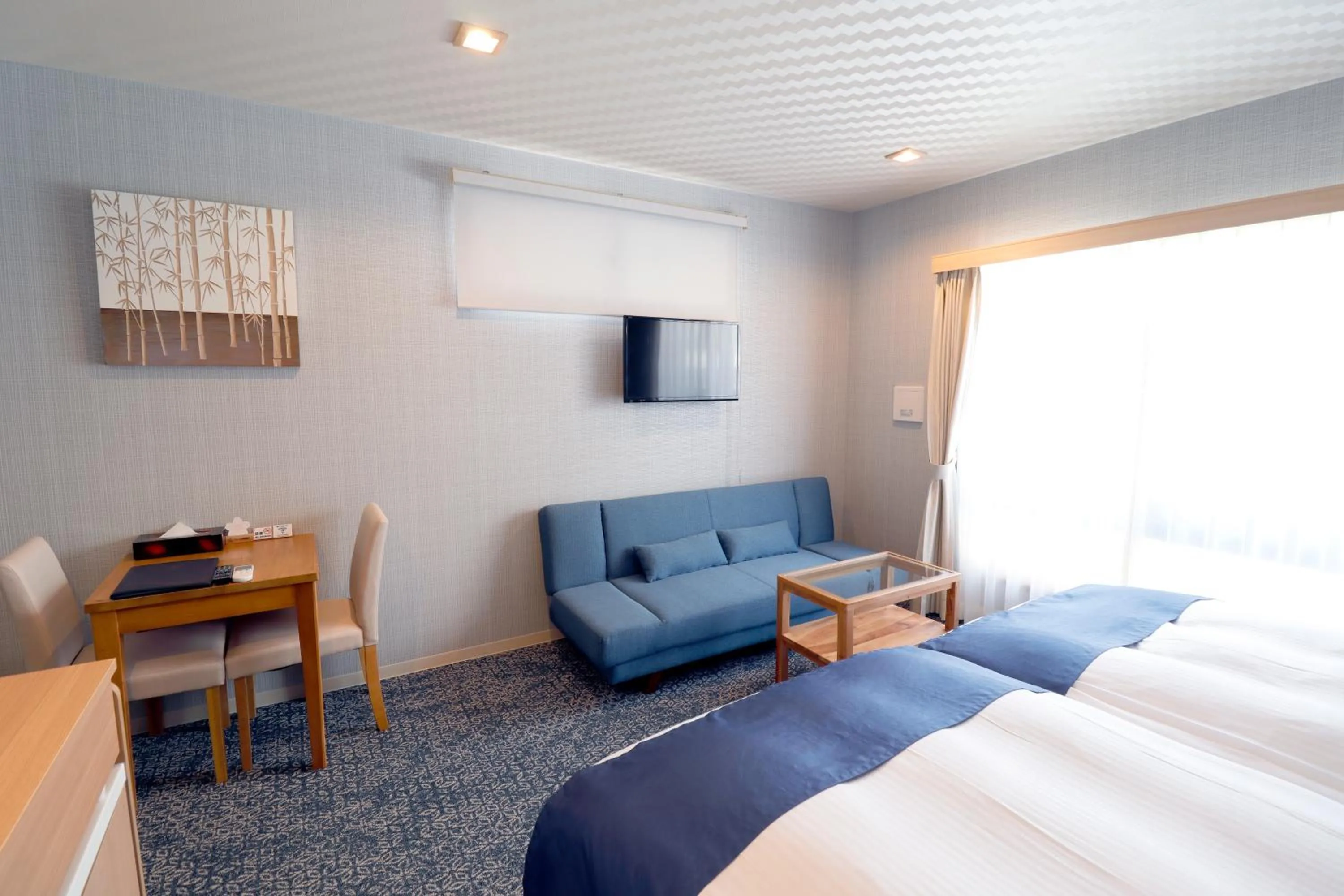 Living room, Bed in Stay SAKURA Kyoto Tambaguchi