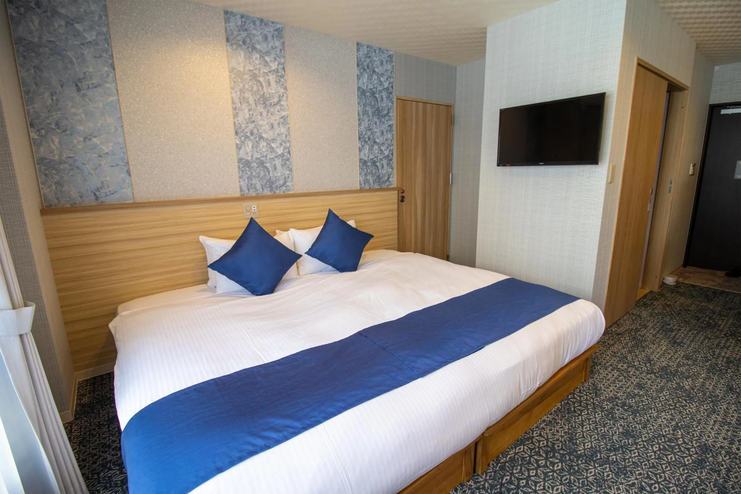 Bed in Stay SAKURA Kyoto Tambaguchi