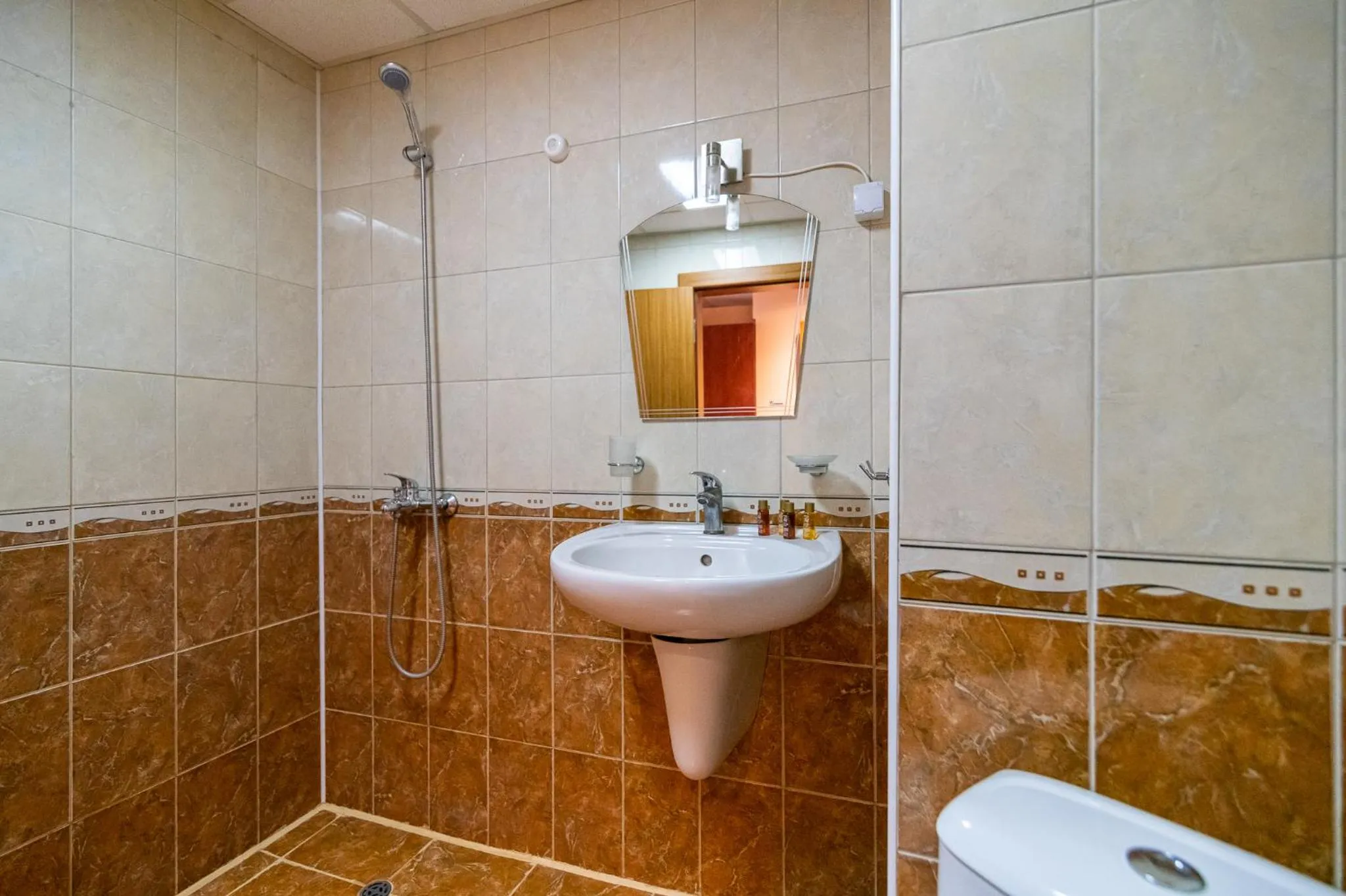 Shower in Adamo Hotel