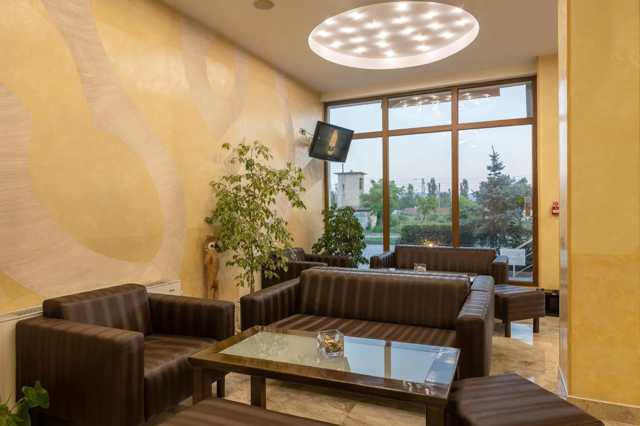 Lobby or reception in Adamo Hotel