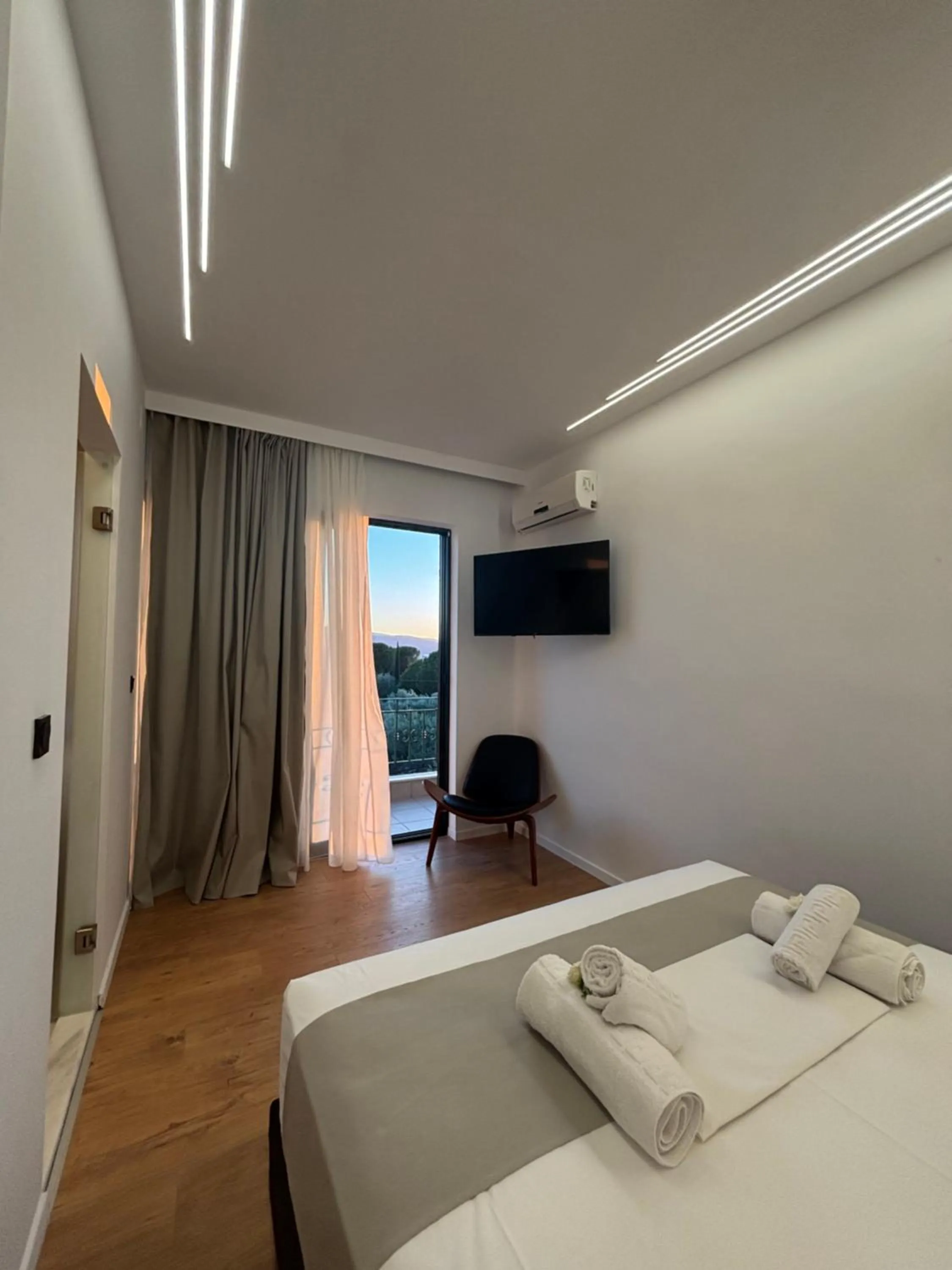 Bed in Ampoulos Rooms & Apartments