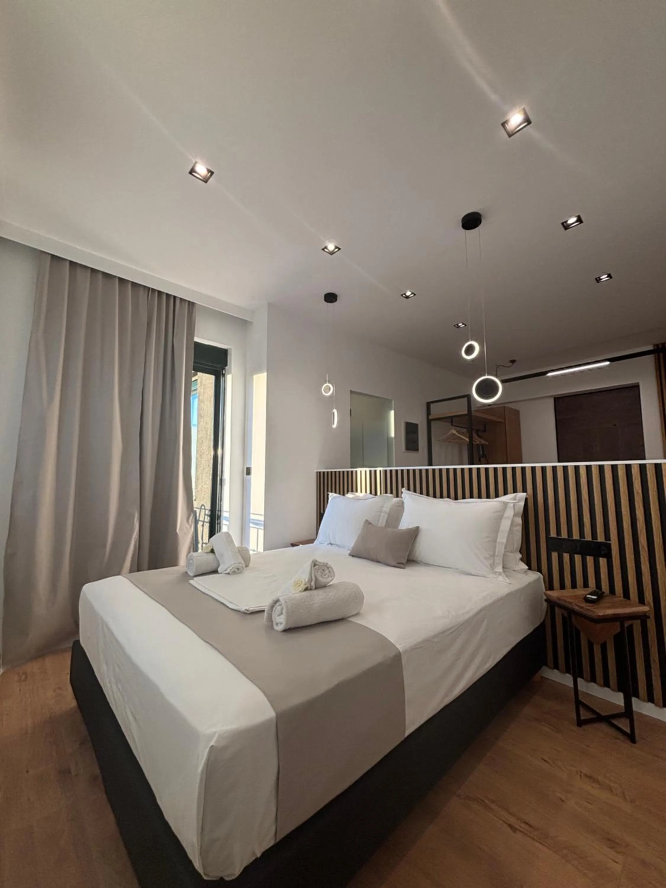 Bed in Ampoulos Rooms & Apartments