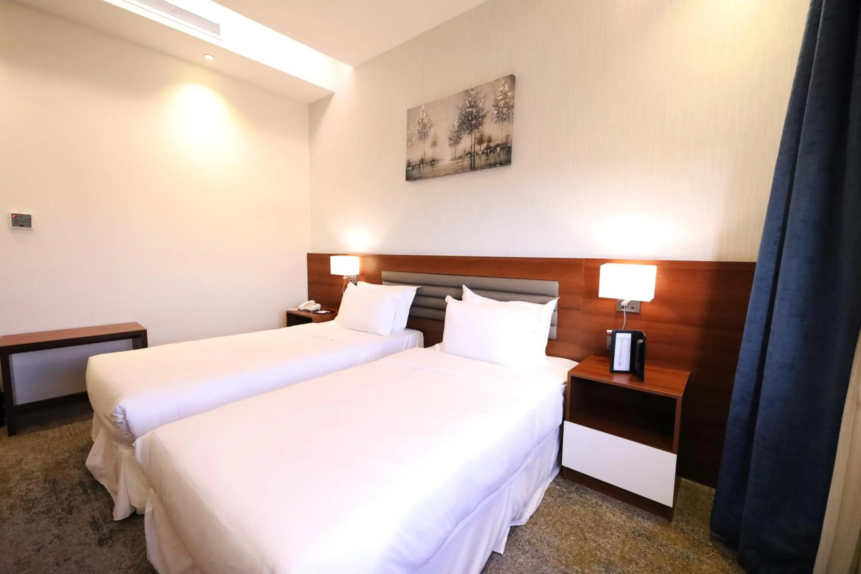 Bedroom in Eva Hotel