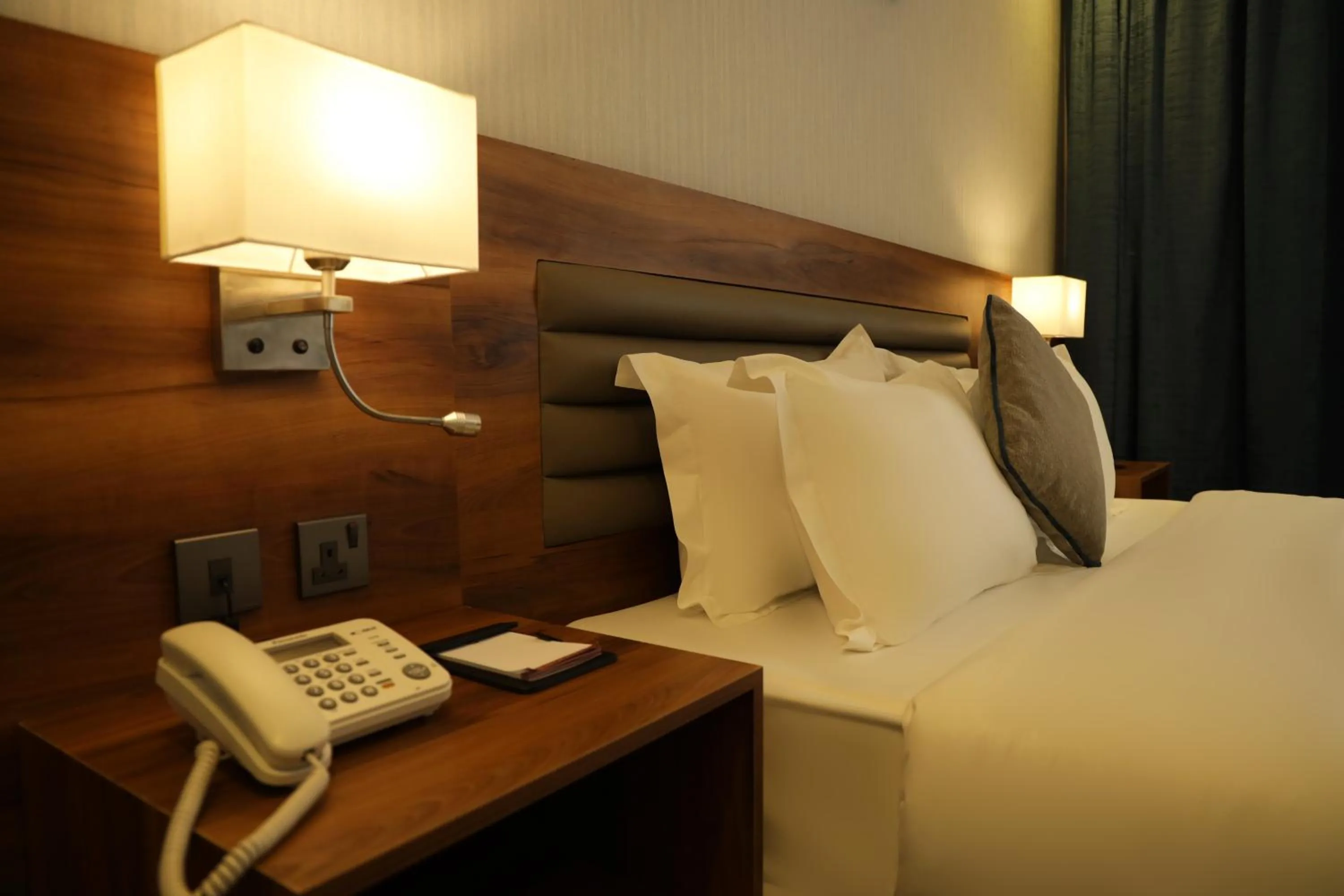 Bedroom in Eva Hotel