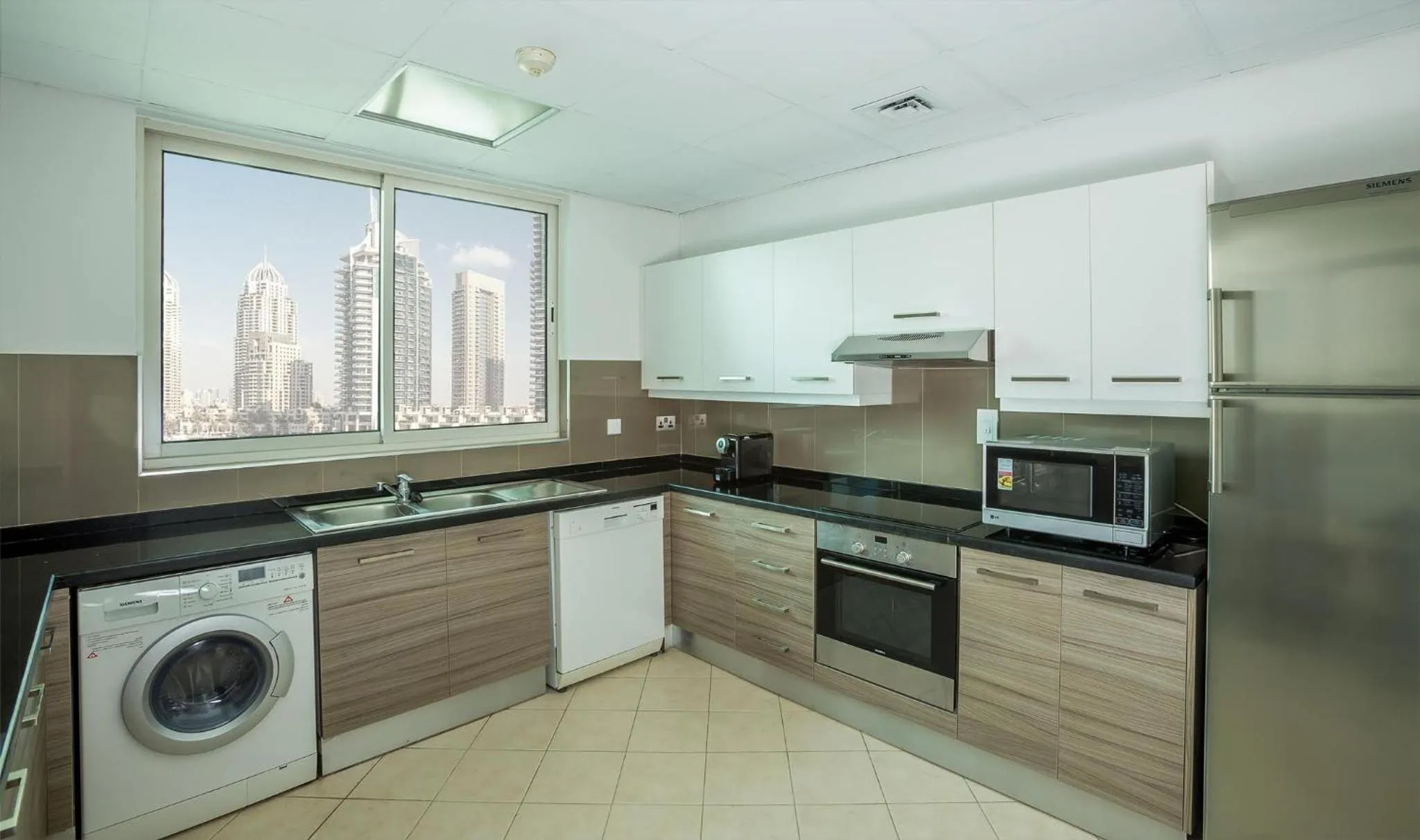 Kitchen or kitchenette in Dusit Princess Residences Dubai Marina