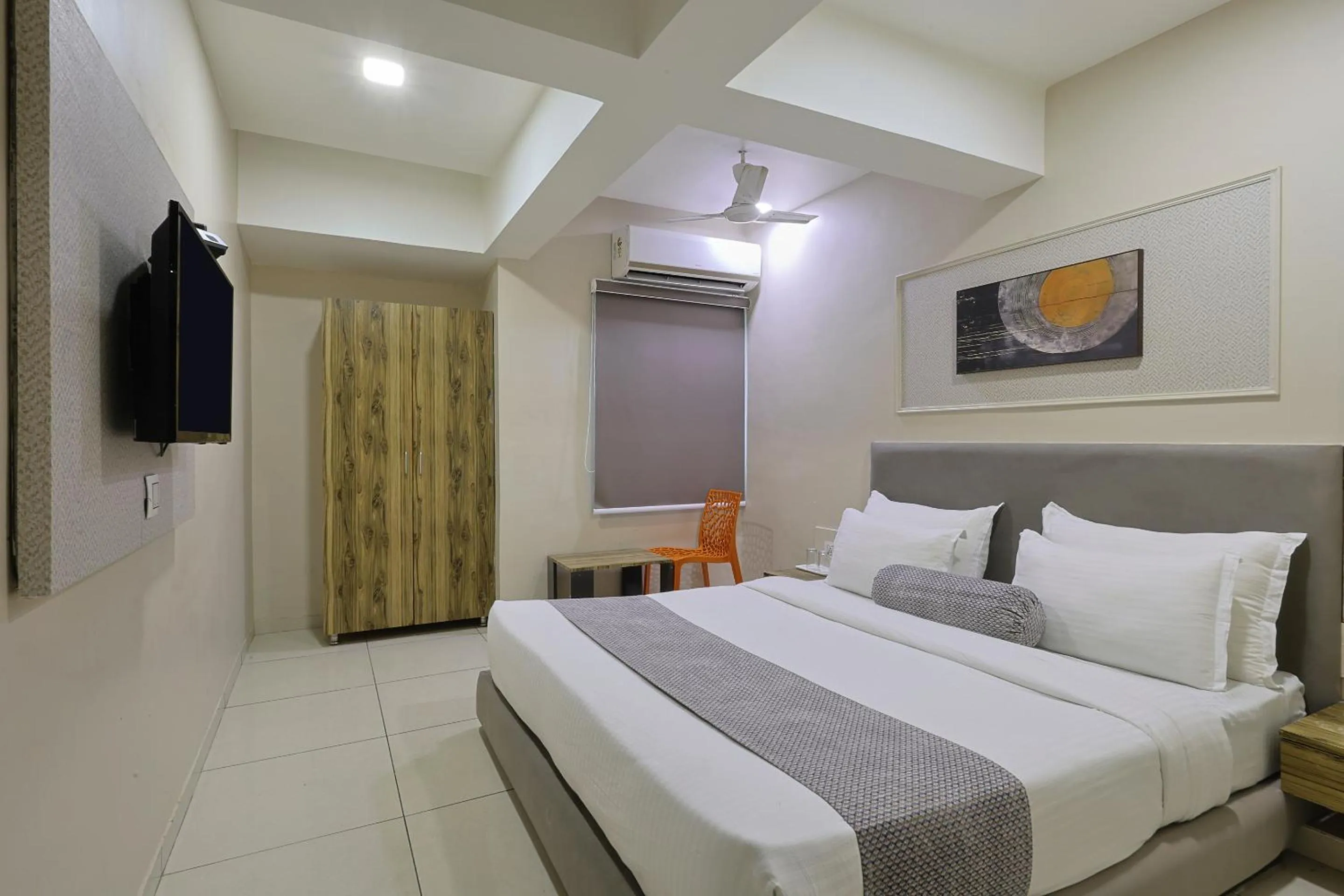 Bed in HOTEL SHALIGRAM