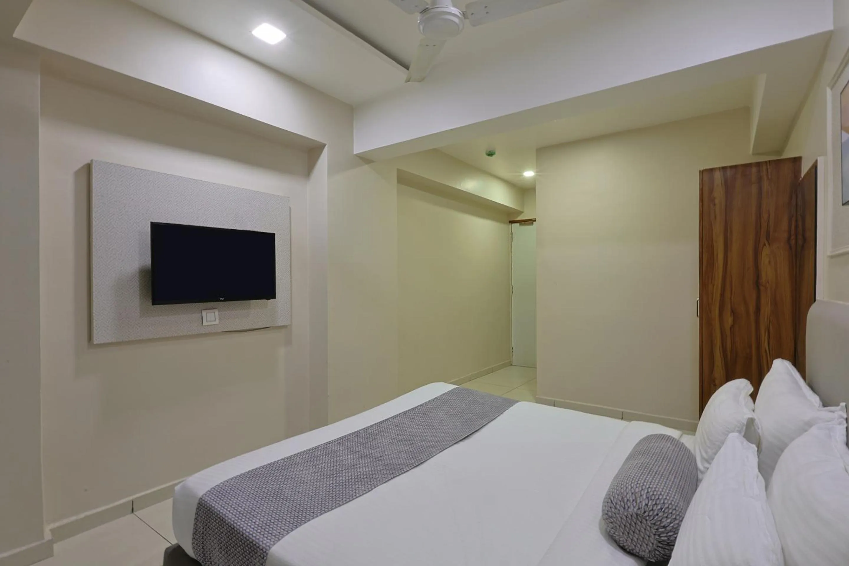 Bed in HOTEL SHALIGRAM