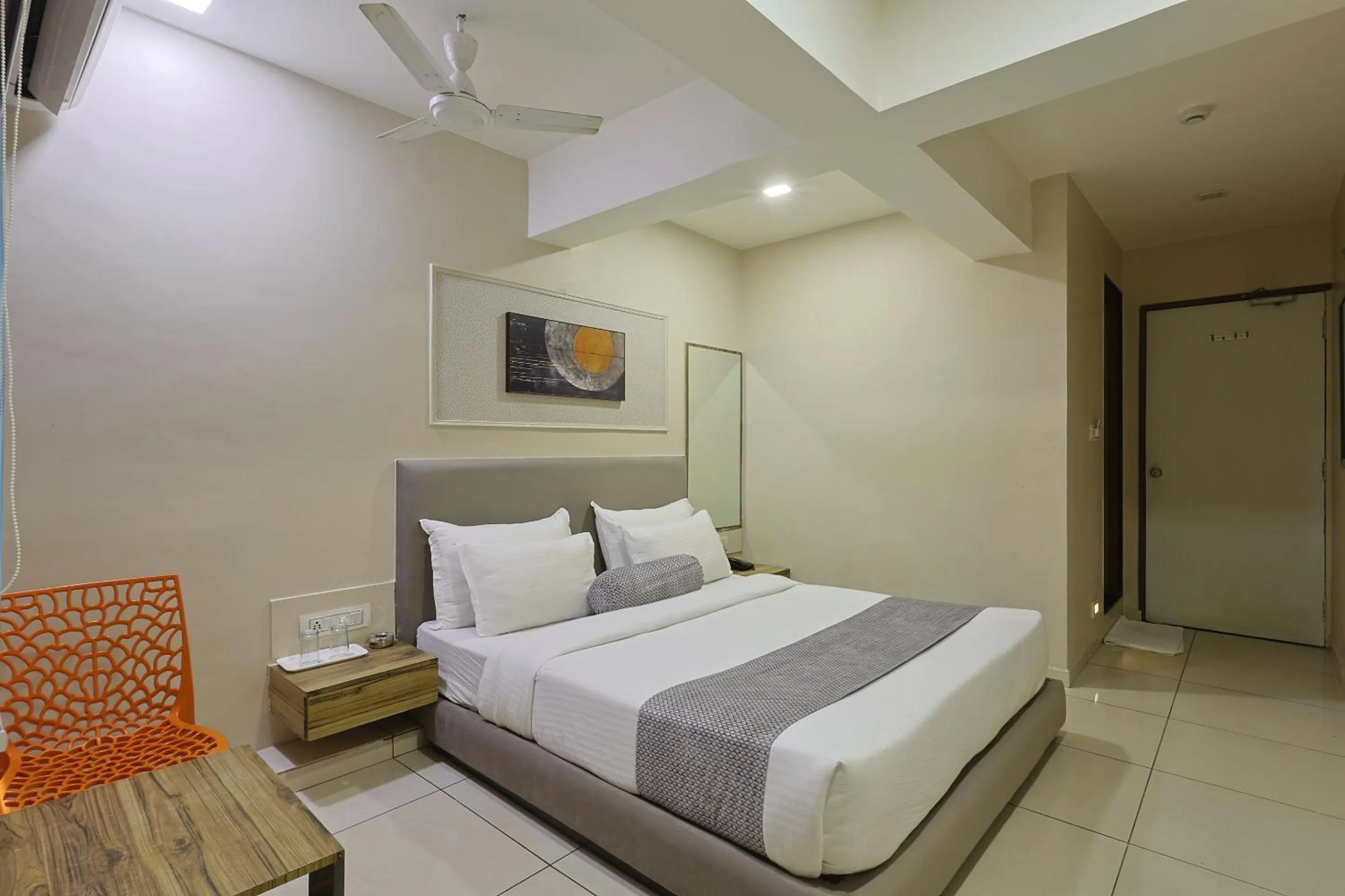 Bed in HOTEL SHALIGRAM